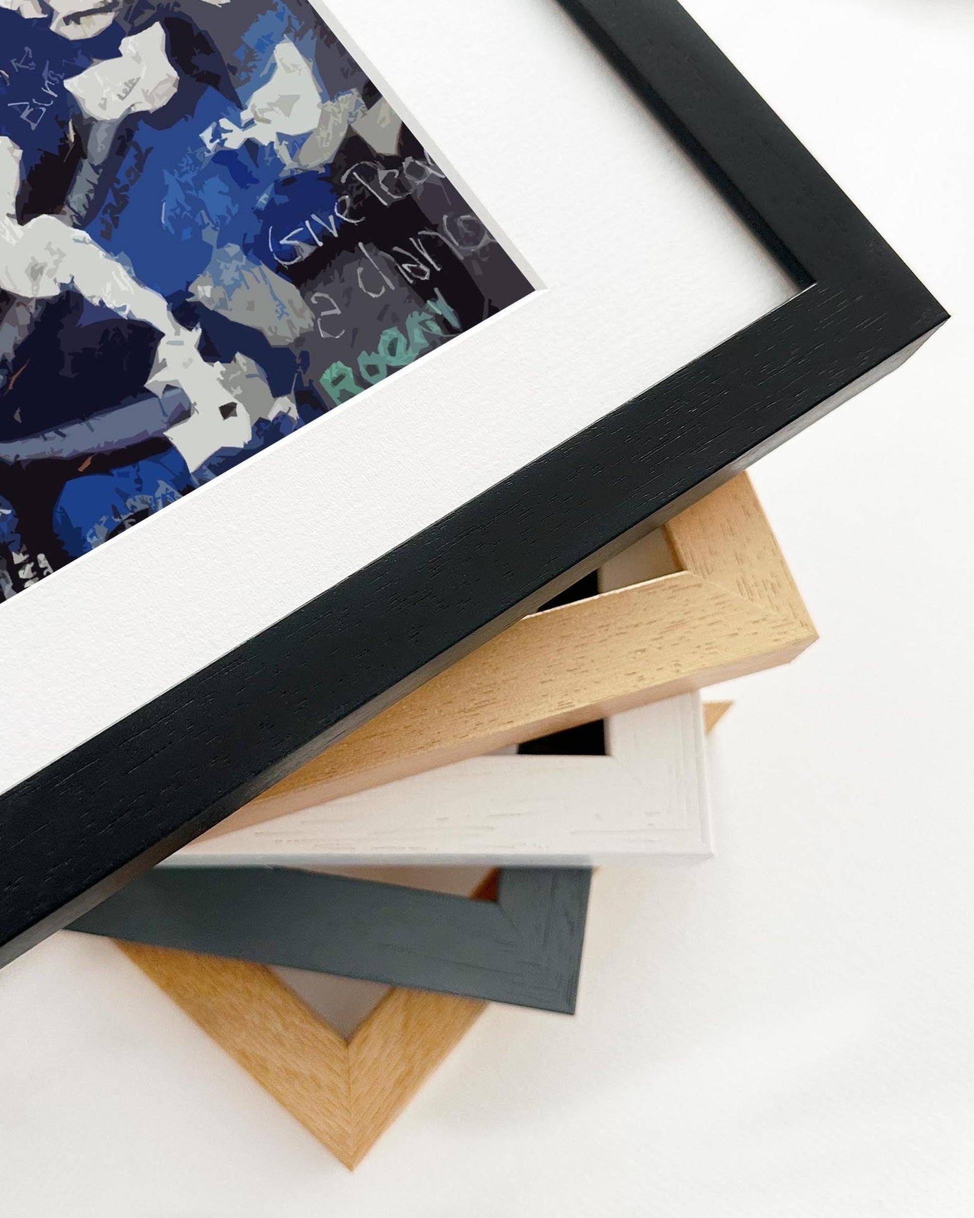 Stack of various photo frames on a white background
