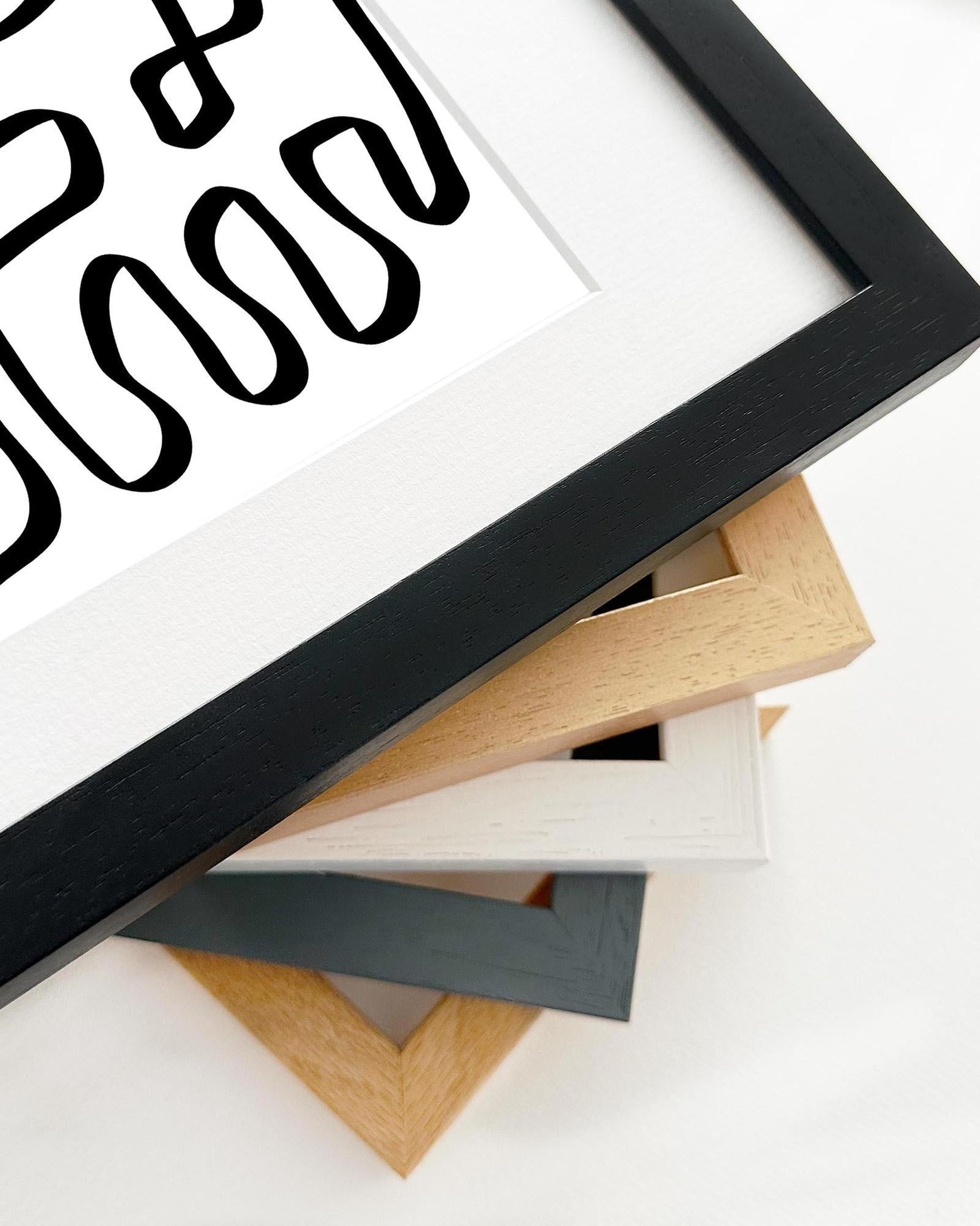 Framed artwork with a black border on a white background