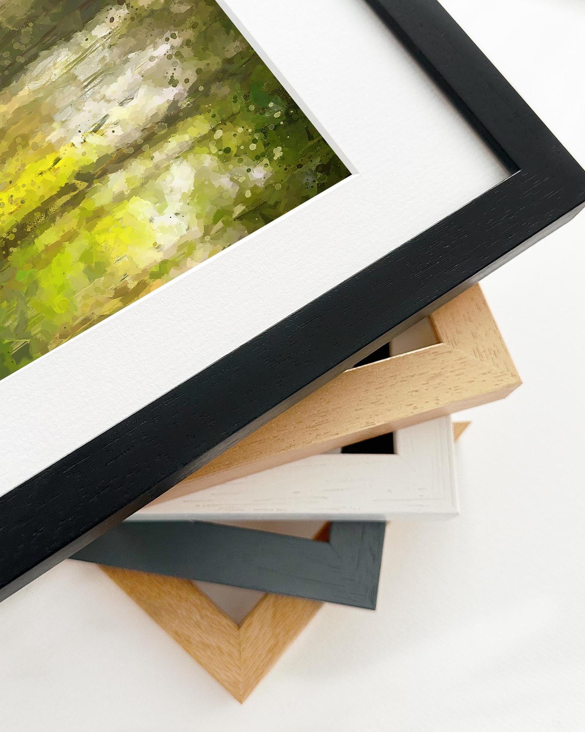 Collection of various picture frames on a white surface