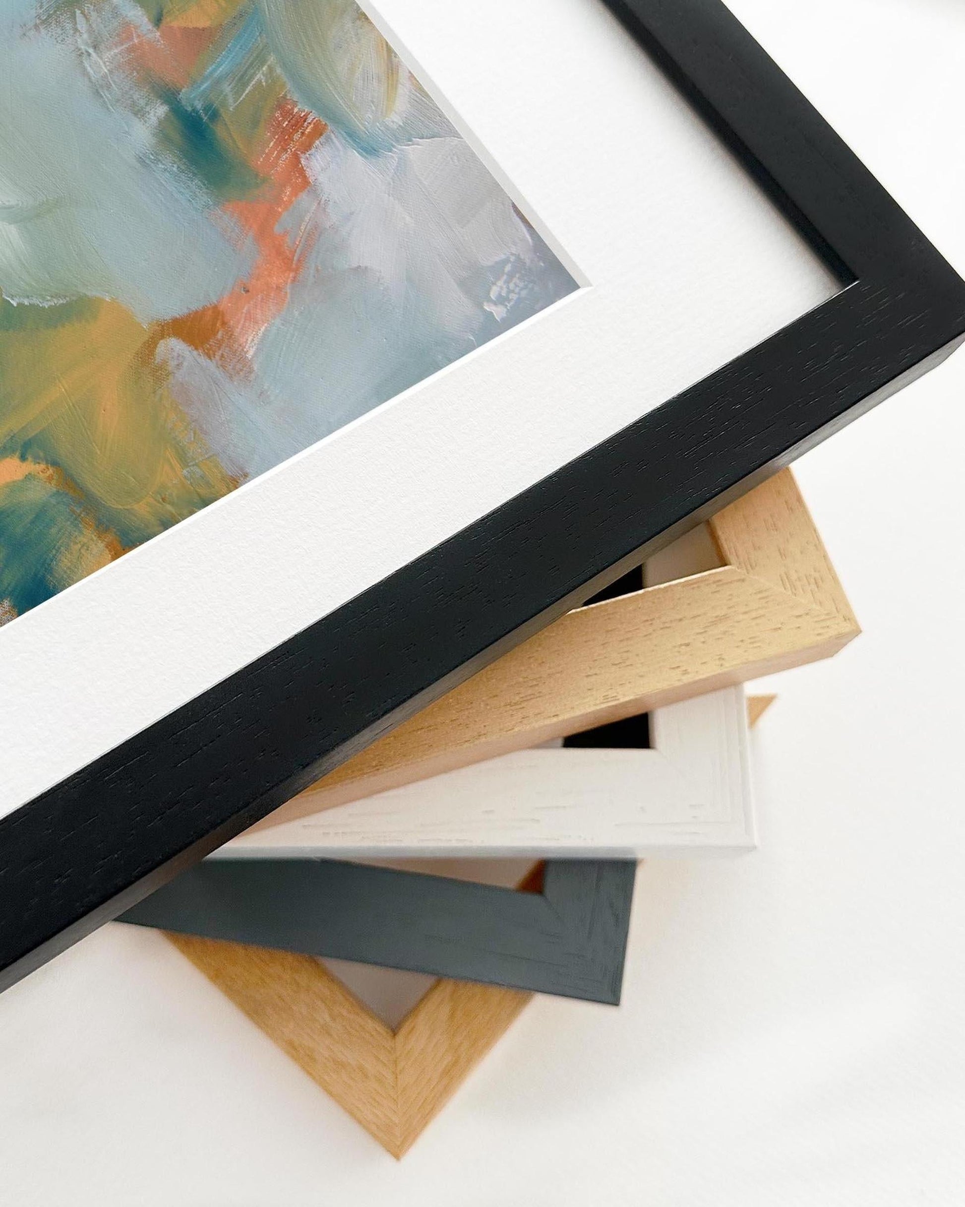 Close-up of various picture frames on a white background