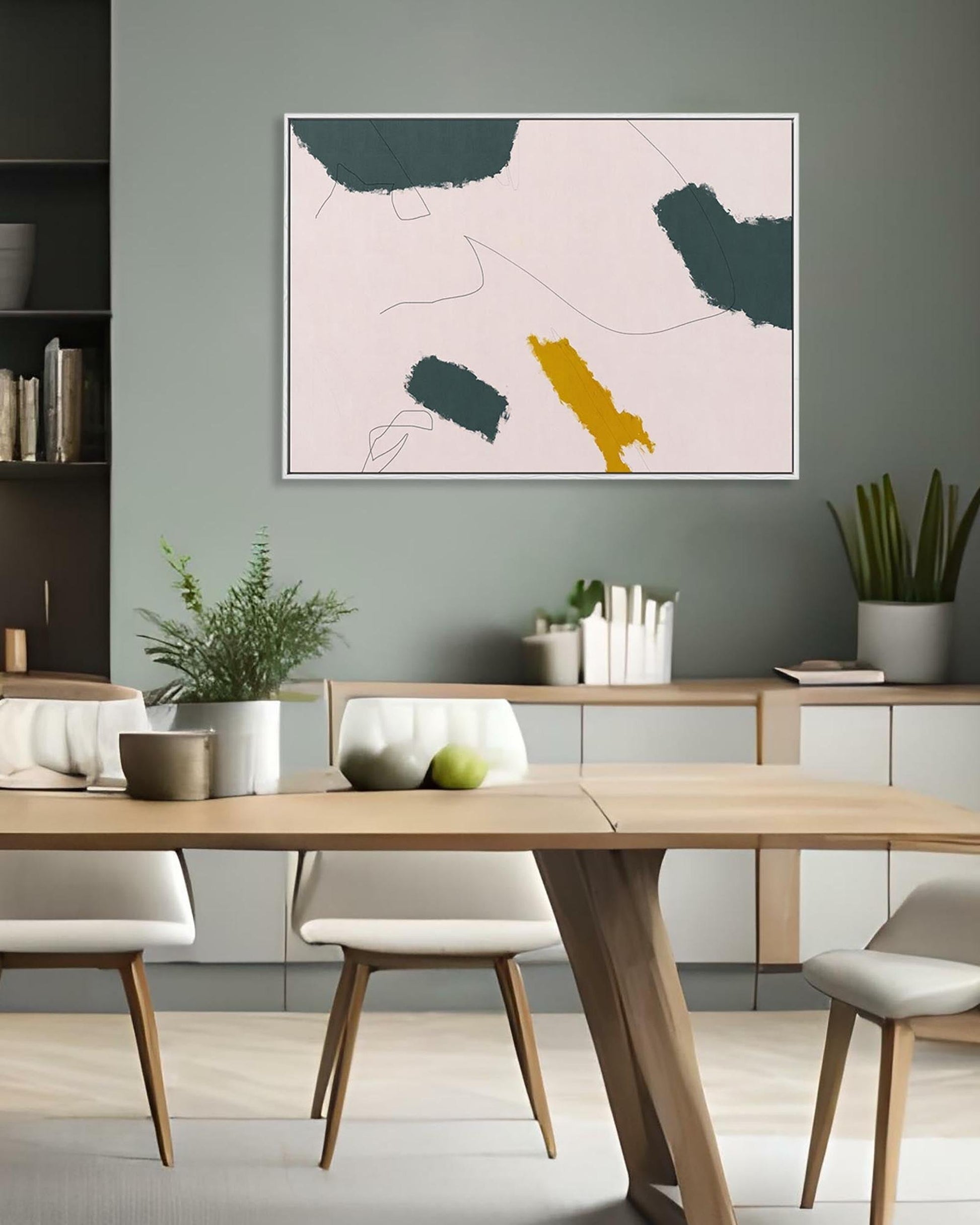 Dining room with a wooden table and chairs, a colorful abstract painting on the wall, and plants.