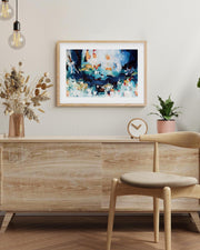 Modern interior with wooden sideboard, chair, and abstract art on the wall.
