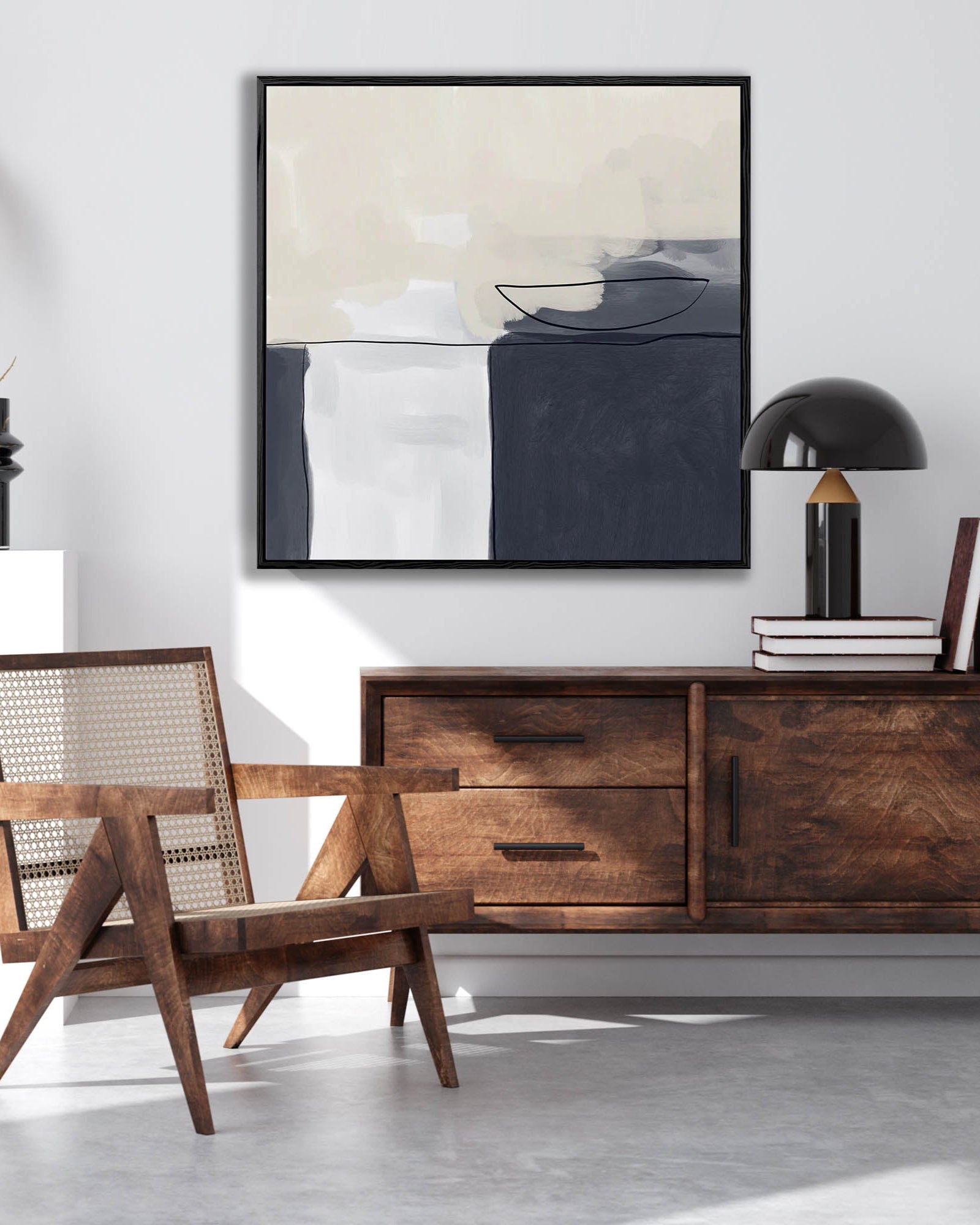 Modern living room with wooden furniture, abstract art, and a chair.
