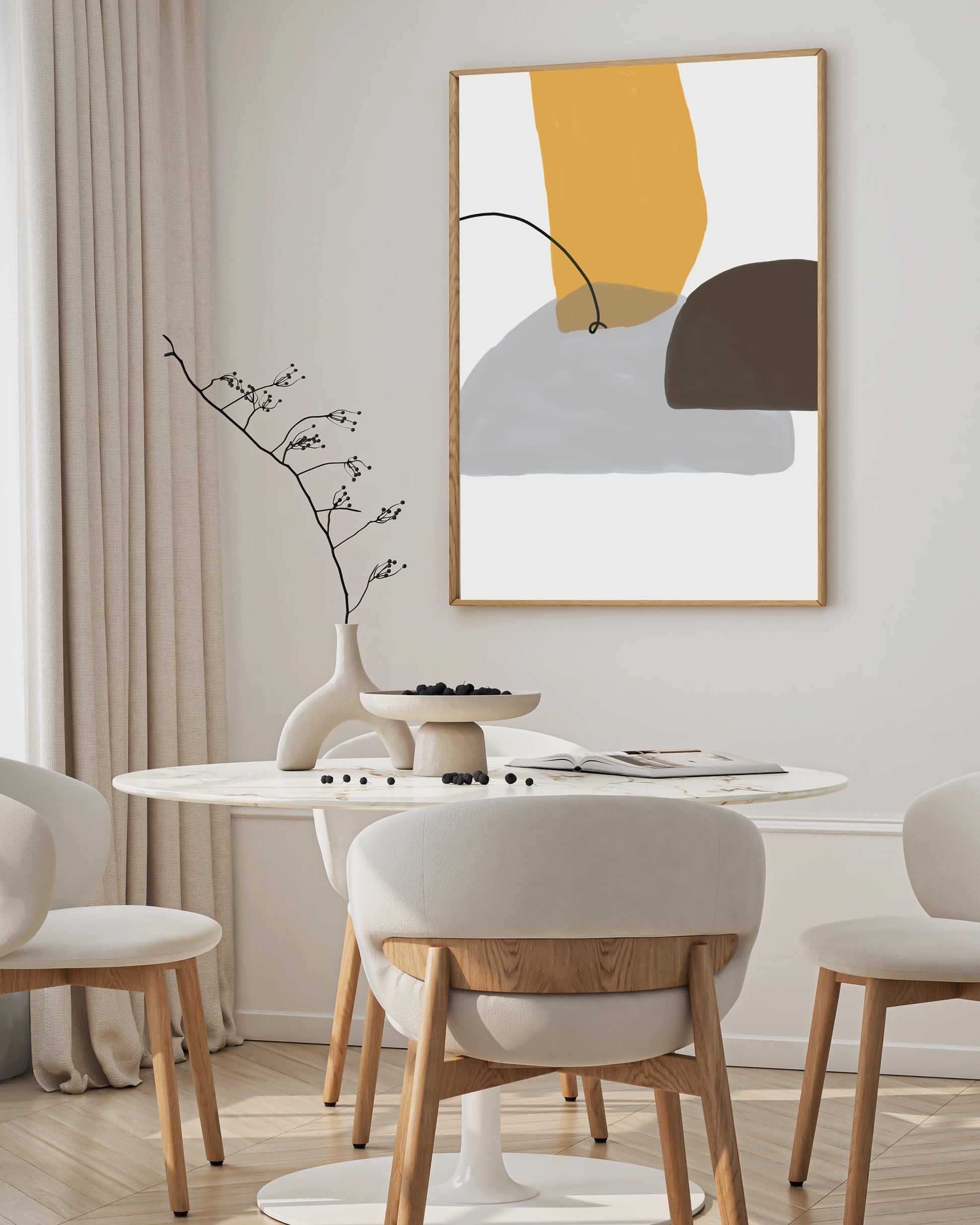 Modern dining room with abstract art on the wall, round table, and chairs.