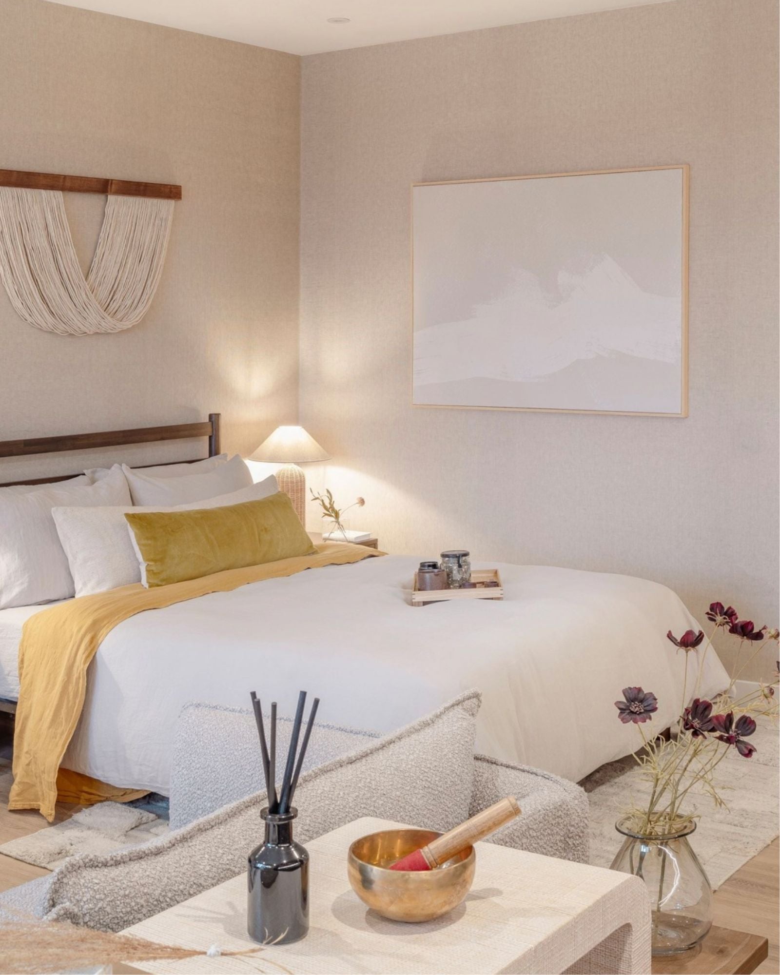 Extra large neutral abstract sands wall art print on canvas in luxury aesthetic refined bedroom with beige walls and luxury accessories.