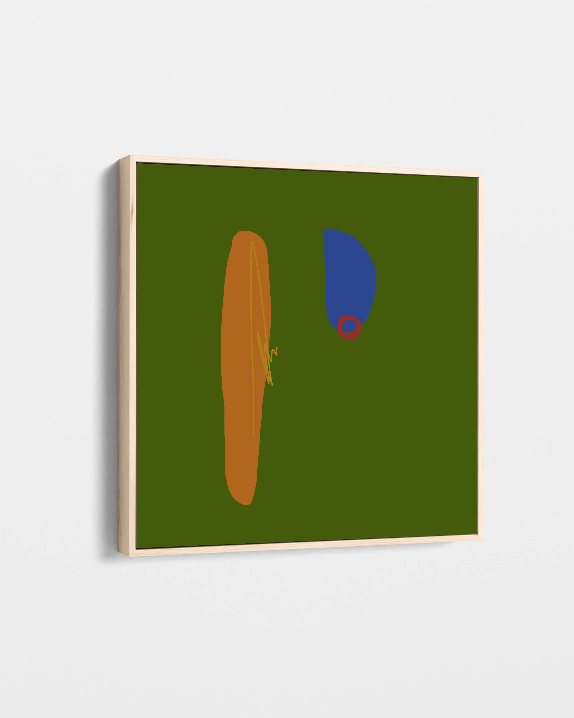 Abstract canvas wall art featuring a dark olive green background with a vertical mustard orange shape, a blue semicircle, and a small red ring, shown in a light wood frame against a white wall.