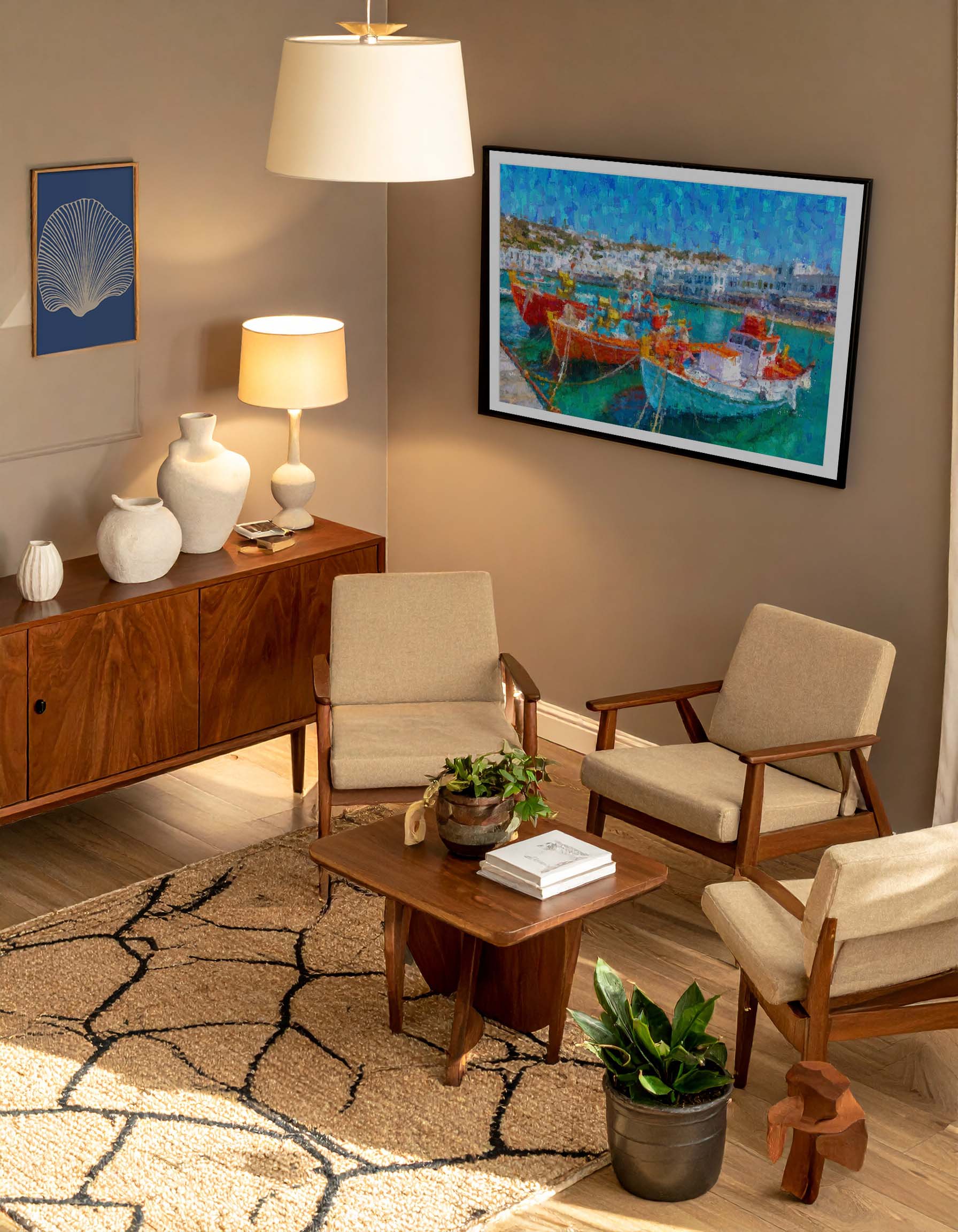 Living room with wooden furniture, lampshades, and a colourful boat painting of a Portuguese quay on the wall.