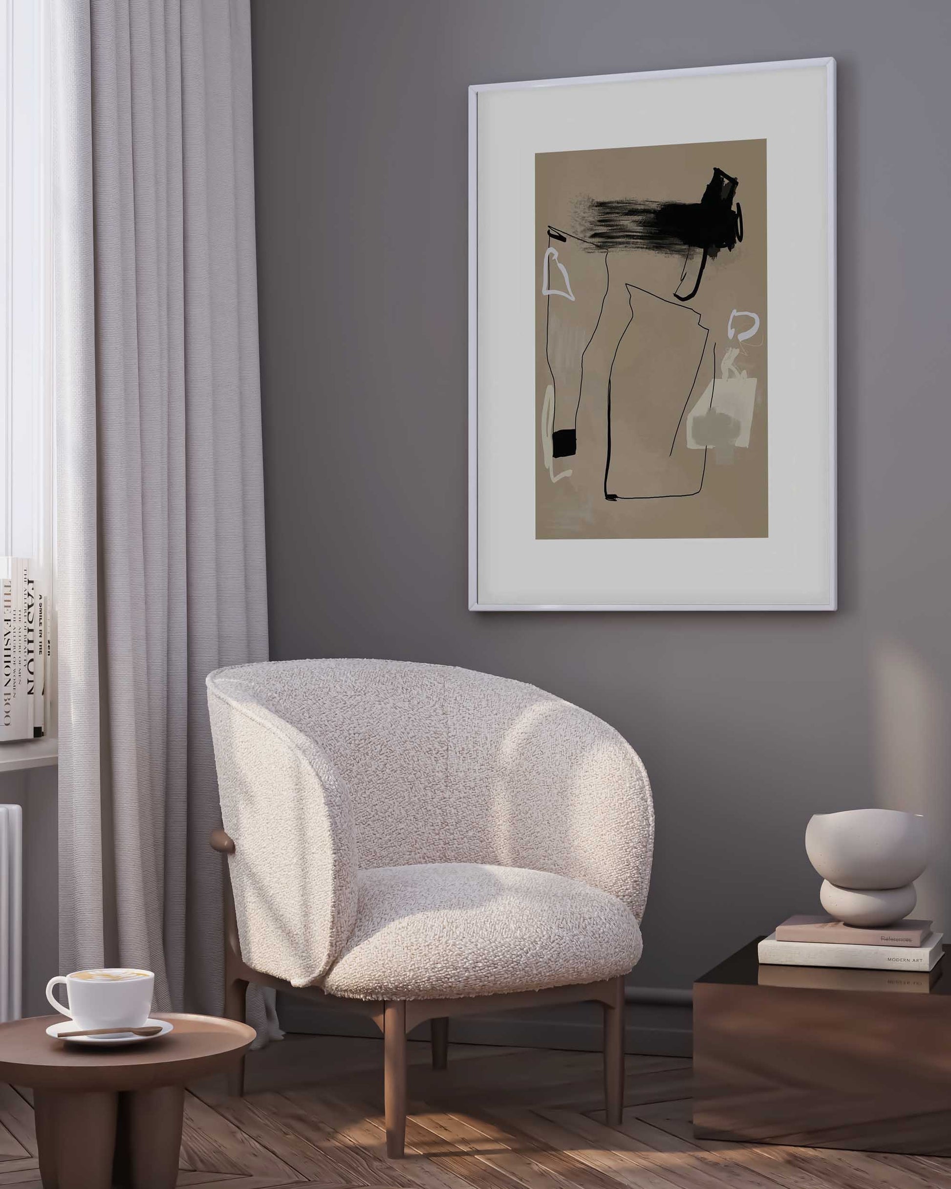 A framed art print depicting a stylized, abstracted representation of a figure in brown tones, displayed on a wall above a modern armchair in a well-lit room.