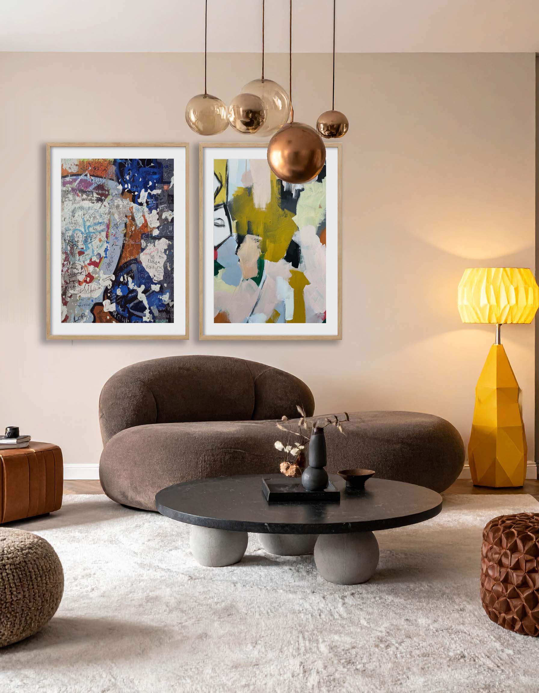 Modern living room with contemporary Japandi brown curved sofa with abstract cityscape wall art, a brown sofa, and a yellow lamp.