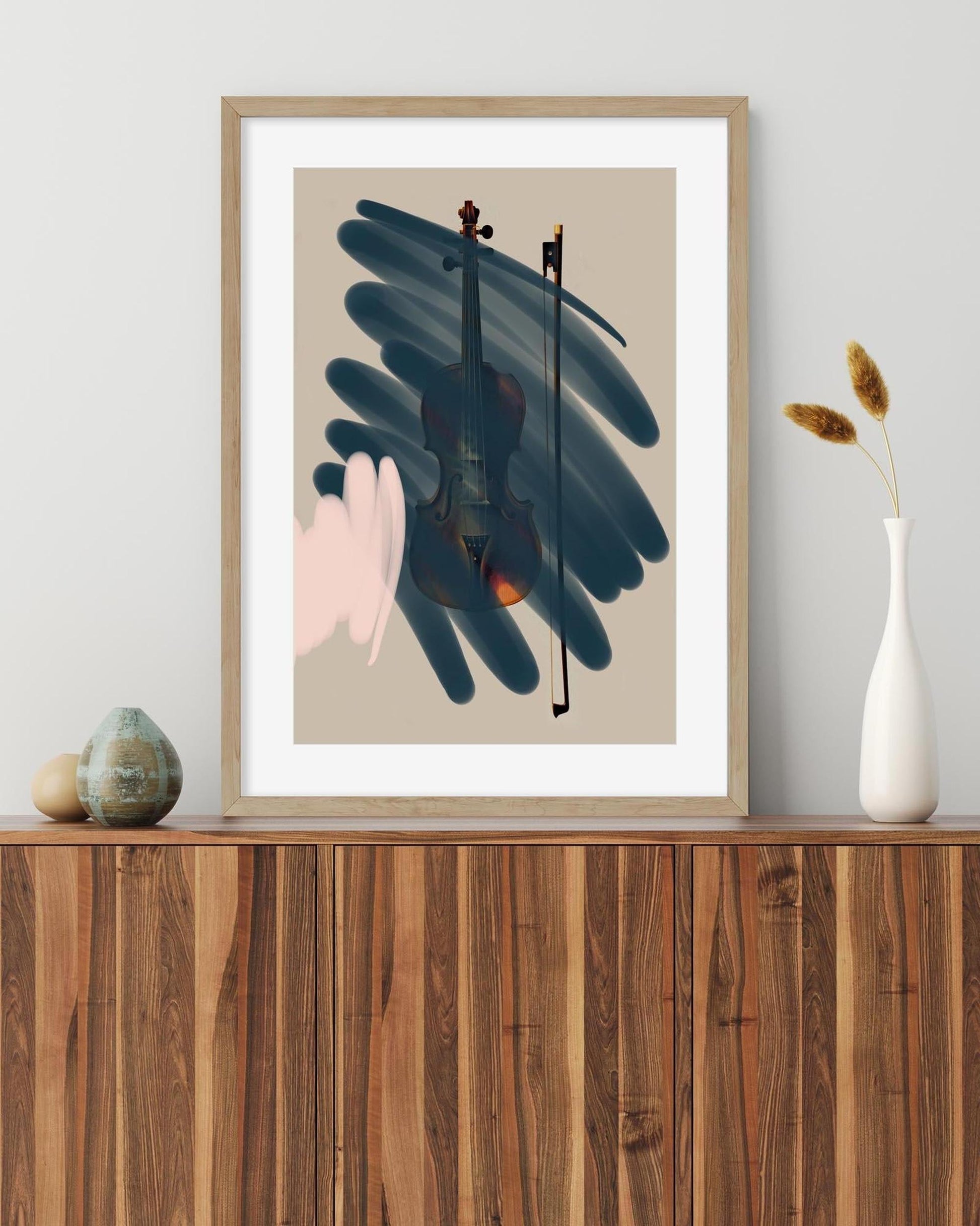Framed abstract art print of a violin on a wooden shelf with decorative items.