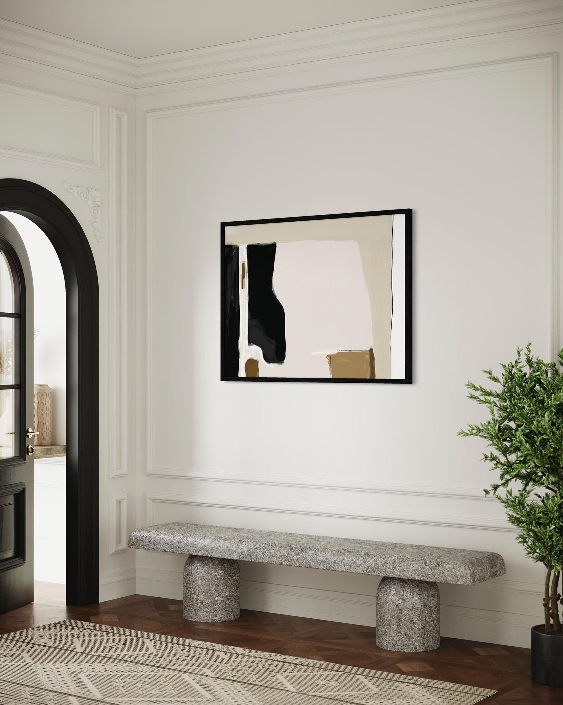 Modern interior with abstract art on the wall, stone bench, and plant.