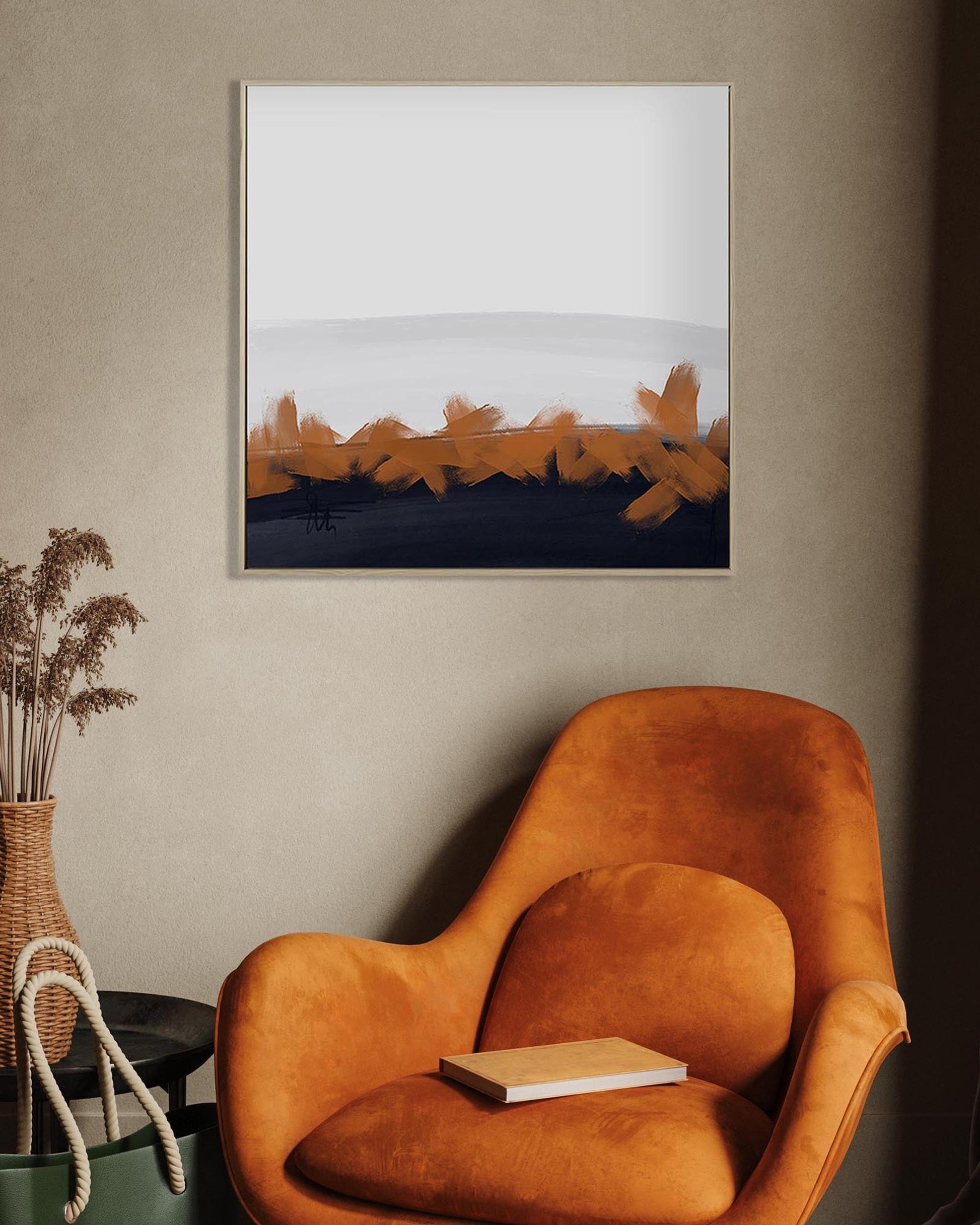 Orange armchair in a room with a abstract painting on the wall