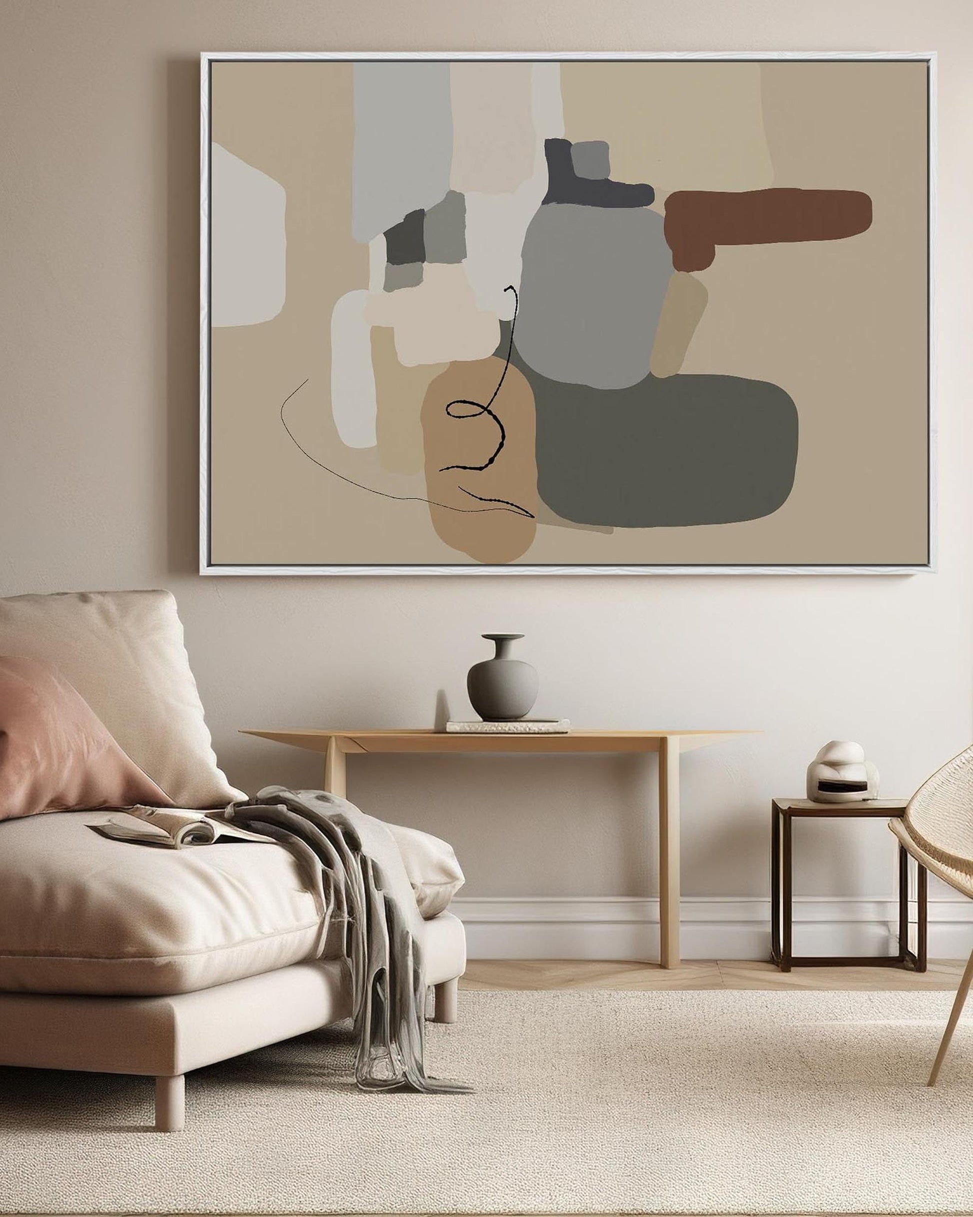 Living room with abstract art on the wall, a sofa, and side tables.