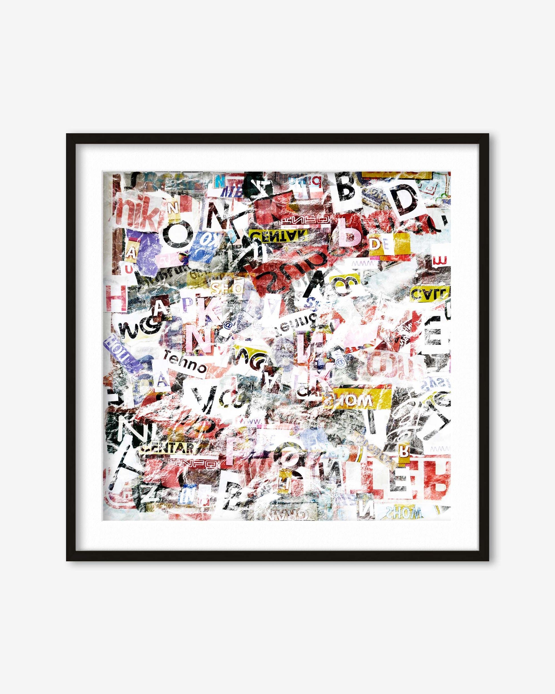 Framed collage of various printed letters and words on a white background