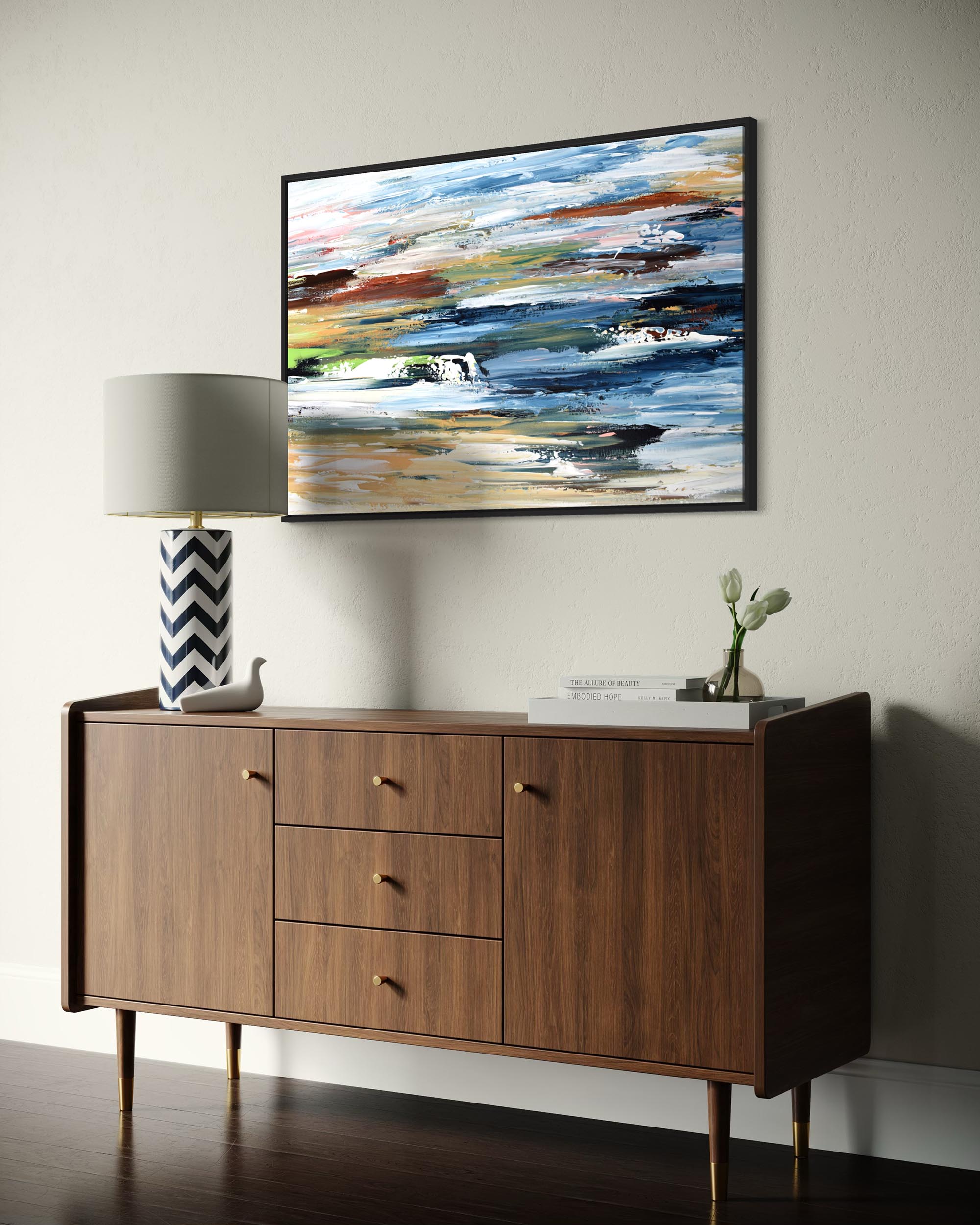 Wooden sideboard with a lamp and abstract painting in a room.