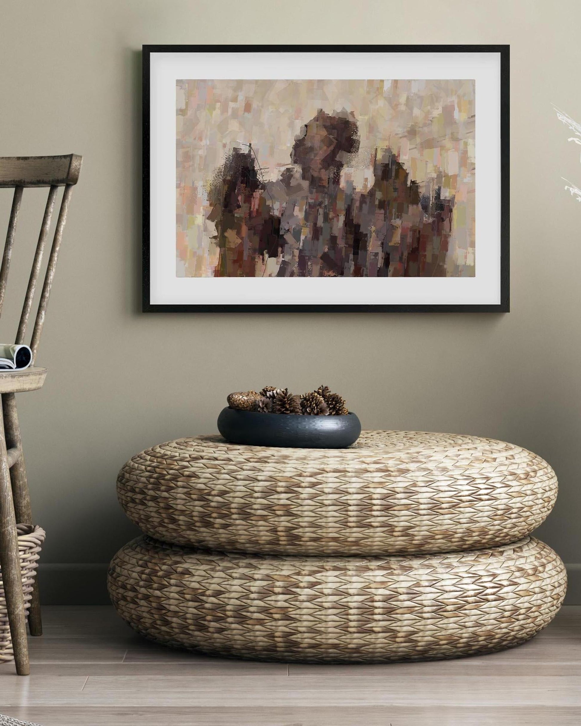 Woven ottoman with decorative bowl and abstract art on wall