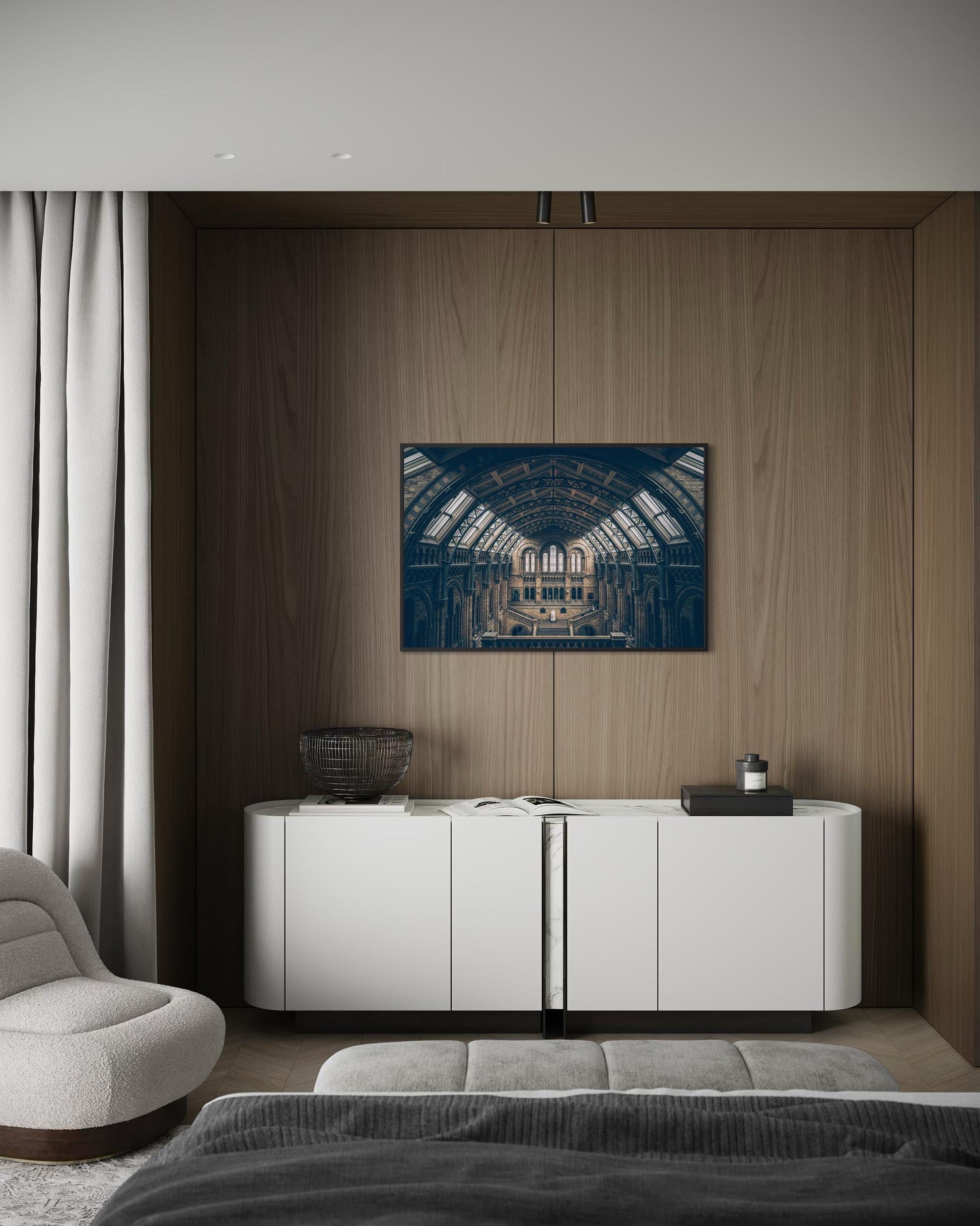 Modern living room with a white cabinet, gray sofa, and abstract painting on a wooden wall.