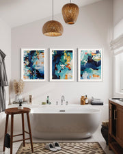 Bathroom interior with a bathtub, abstract art on the wall, and wooden stool.