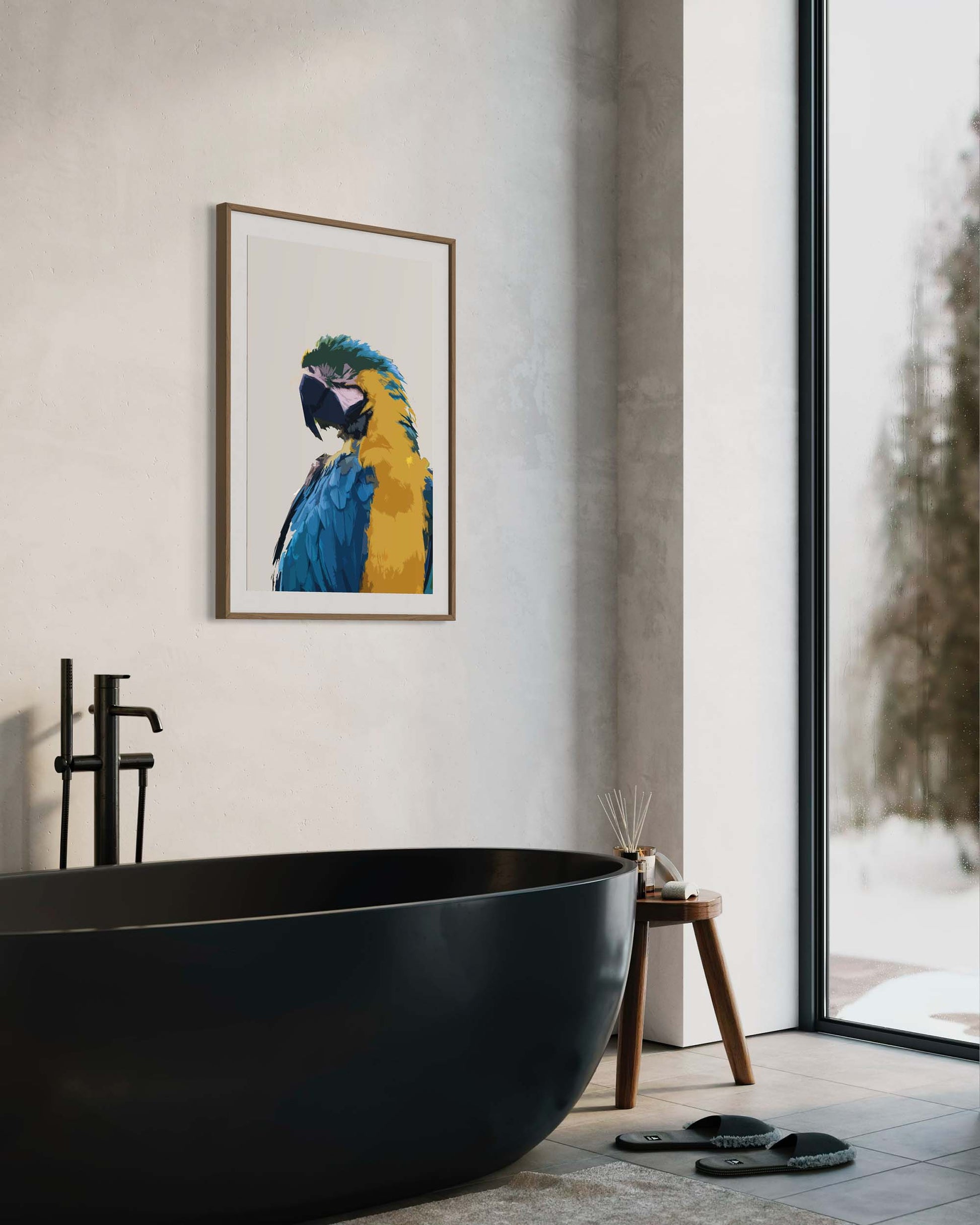 Modern bathroom with a black freestanding bathtub, framed parrot art on the wall, and a window view.