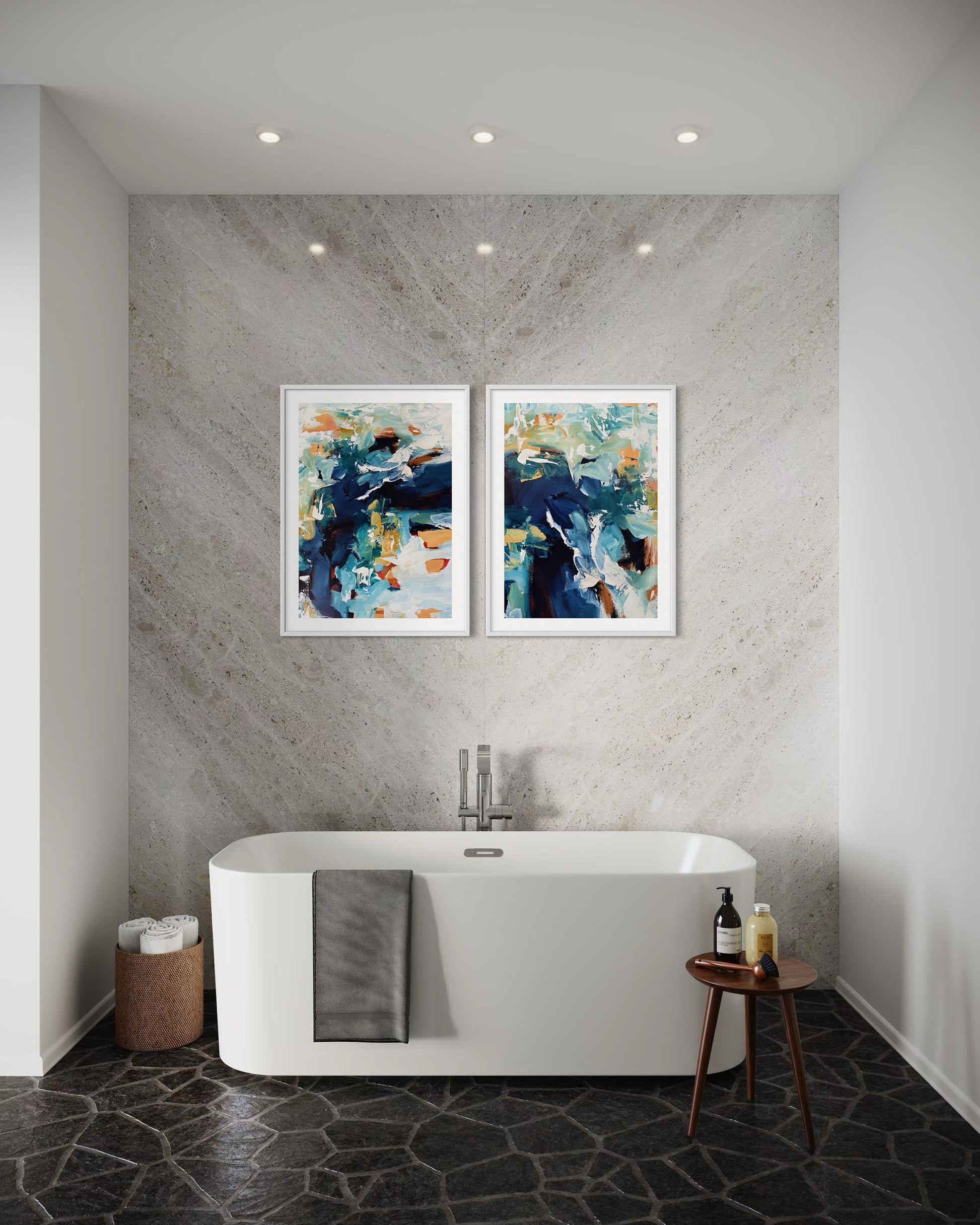 Bathroom with a freestanding bathtub, abstract art on the wall, and a small table with items.