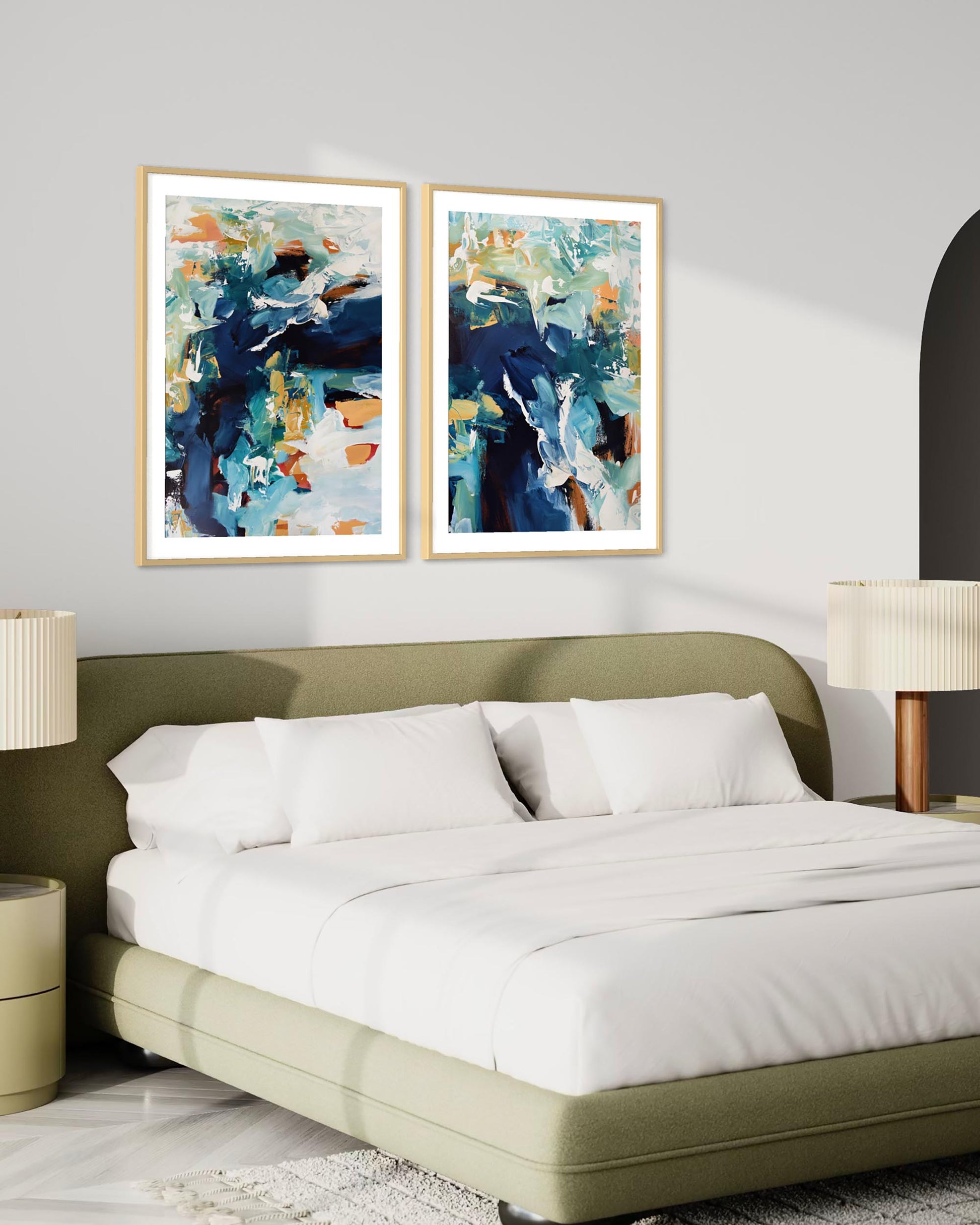 Bedroom with green bed, white pillows, and abstract art on the wall.