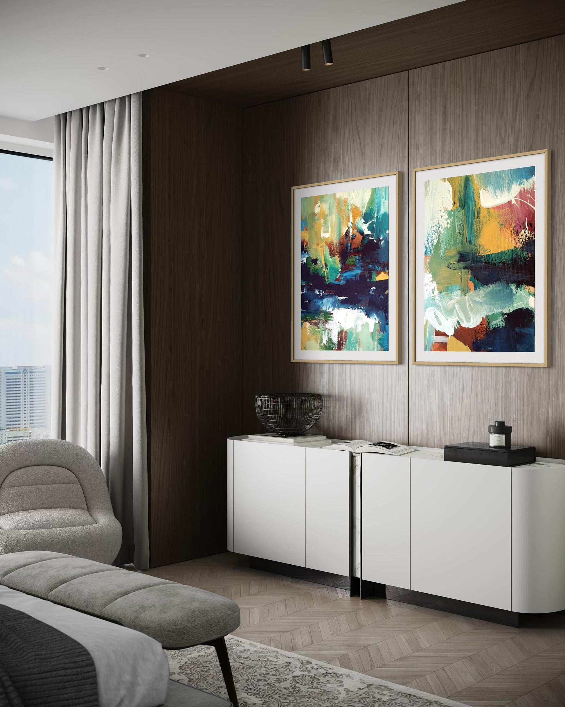 Modern living room with abstract art on the wall and a white cabinet.