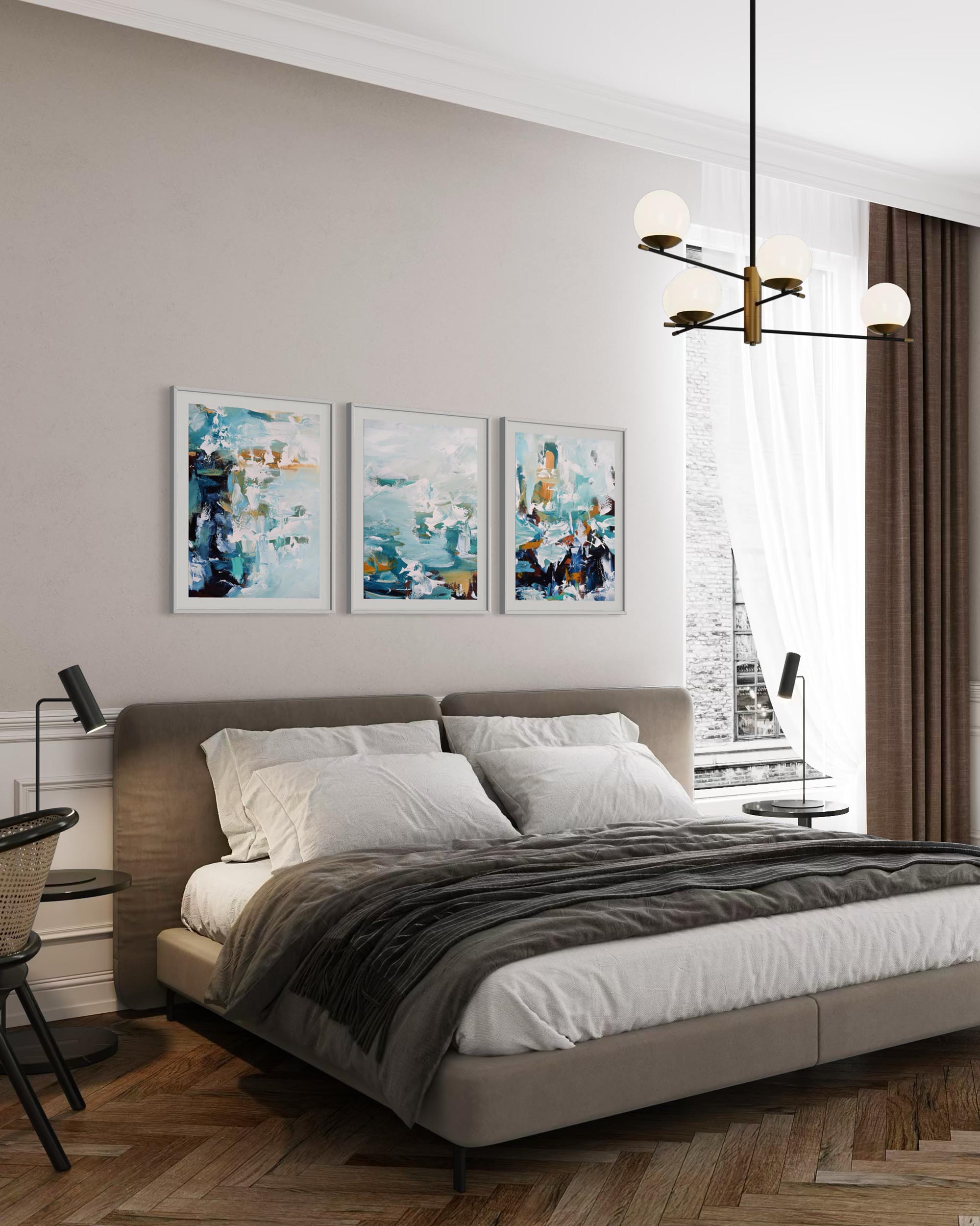 Modern bedroom with a bed, wall art, and a chandelier.