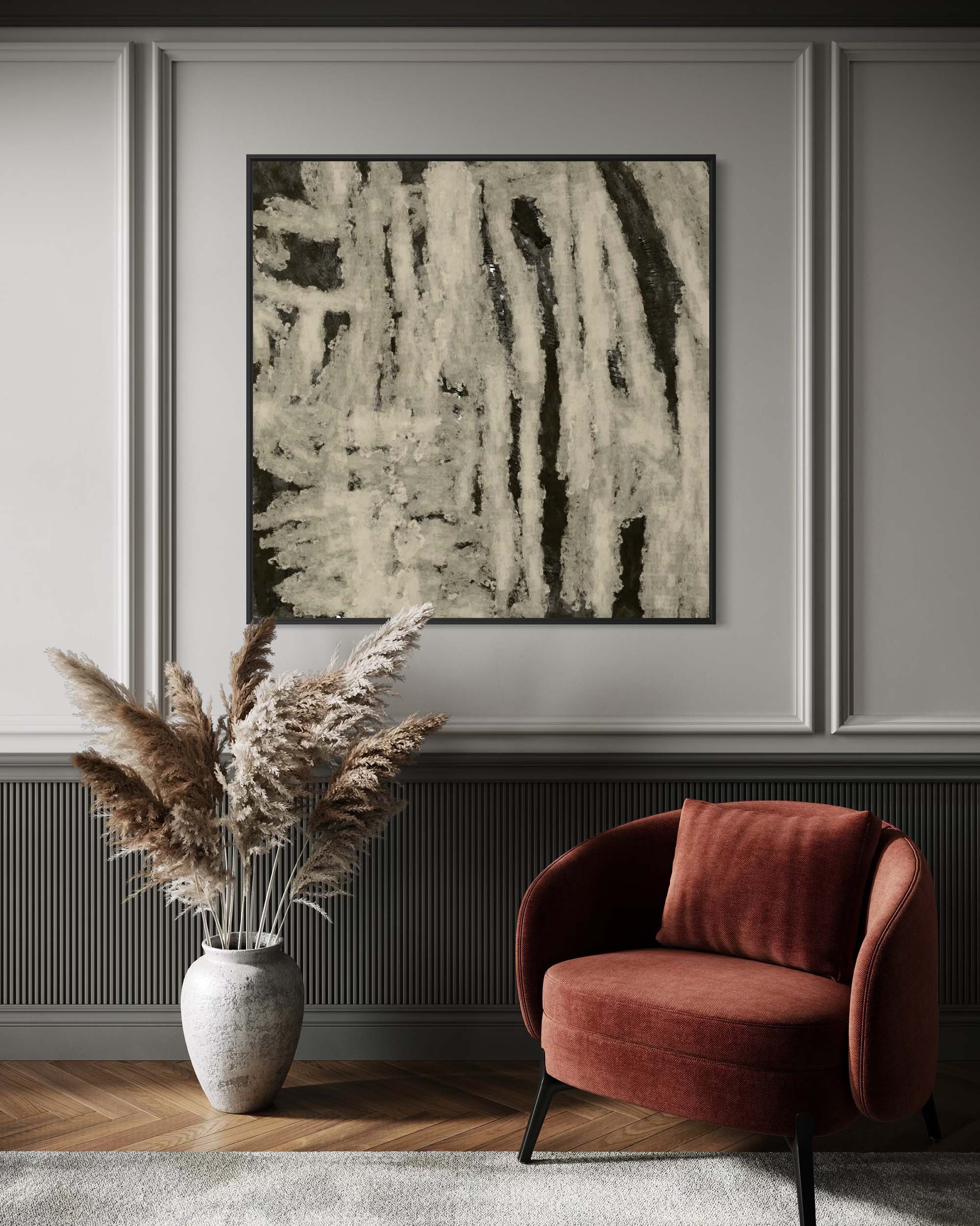 Living room with a red armchair, vase of pampas grass, and abstract painting on the wall.