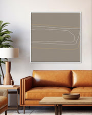 Modern living room with brown leather sofa, abstract art, and potted plant.