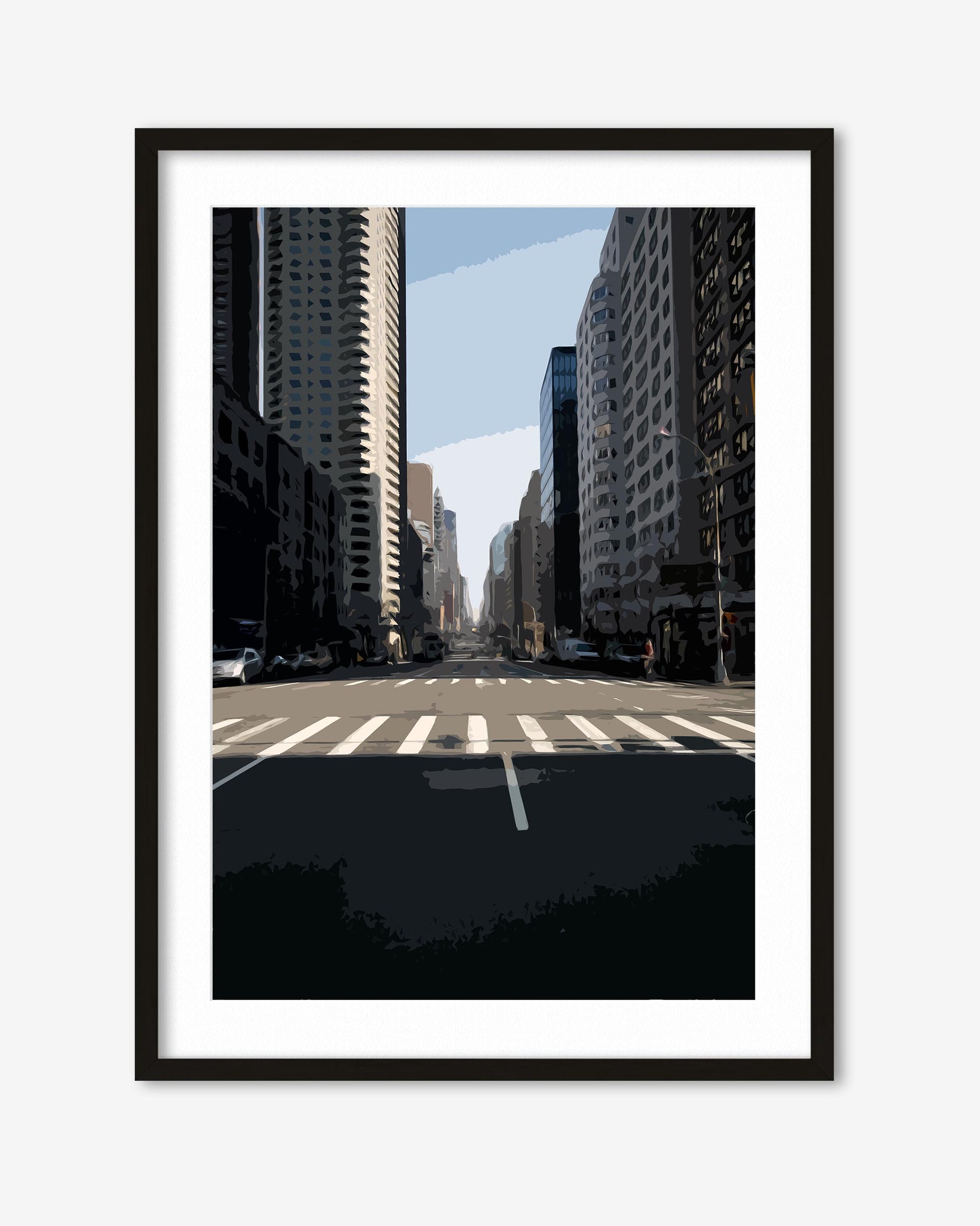 Framed city street with tall buildings and a clear sky