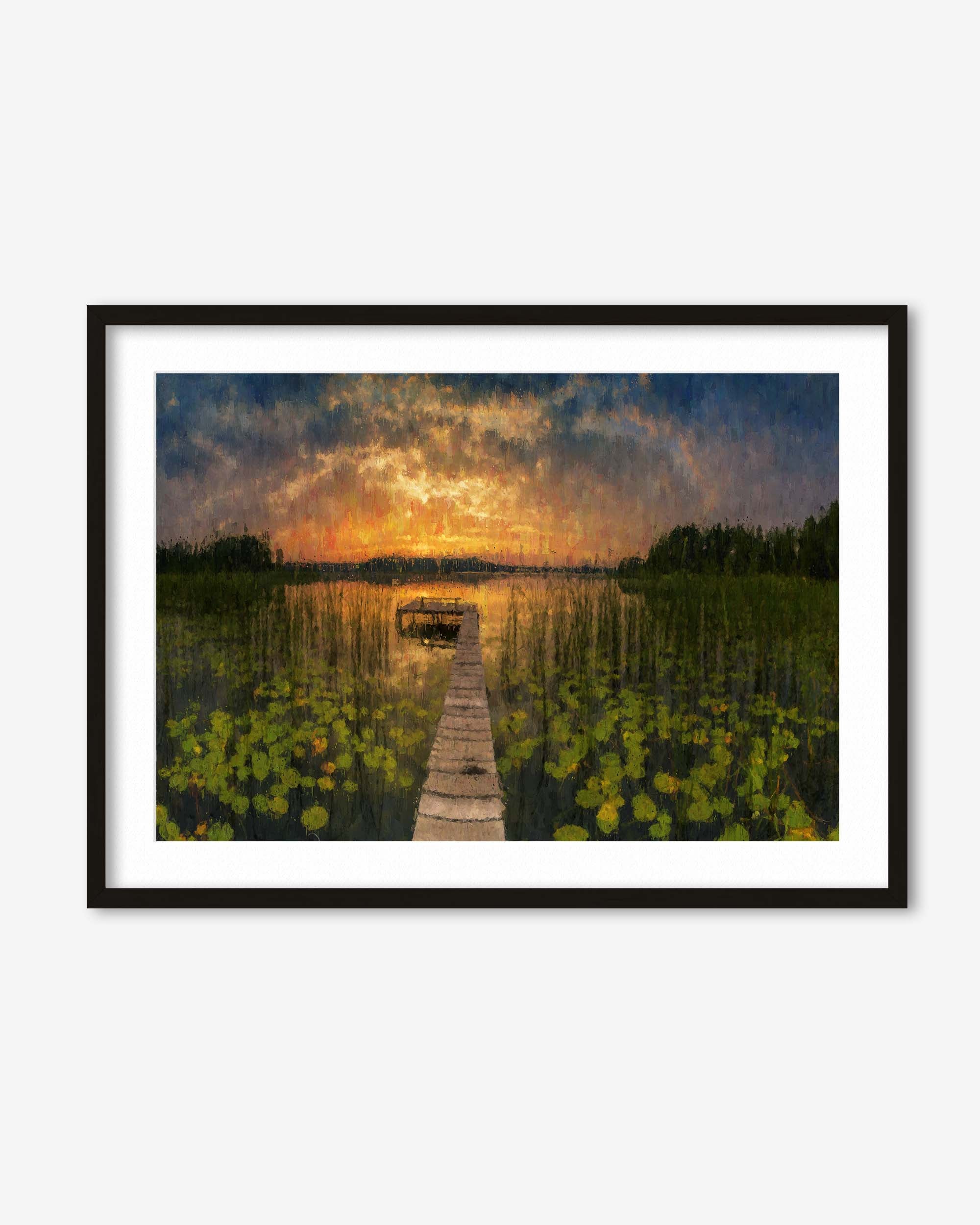 Framed artwork of a dock extending into a lake at sunset.