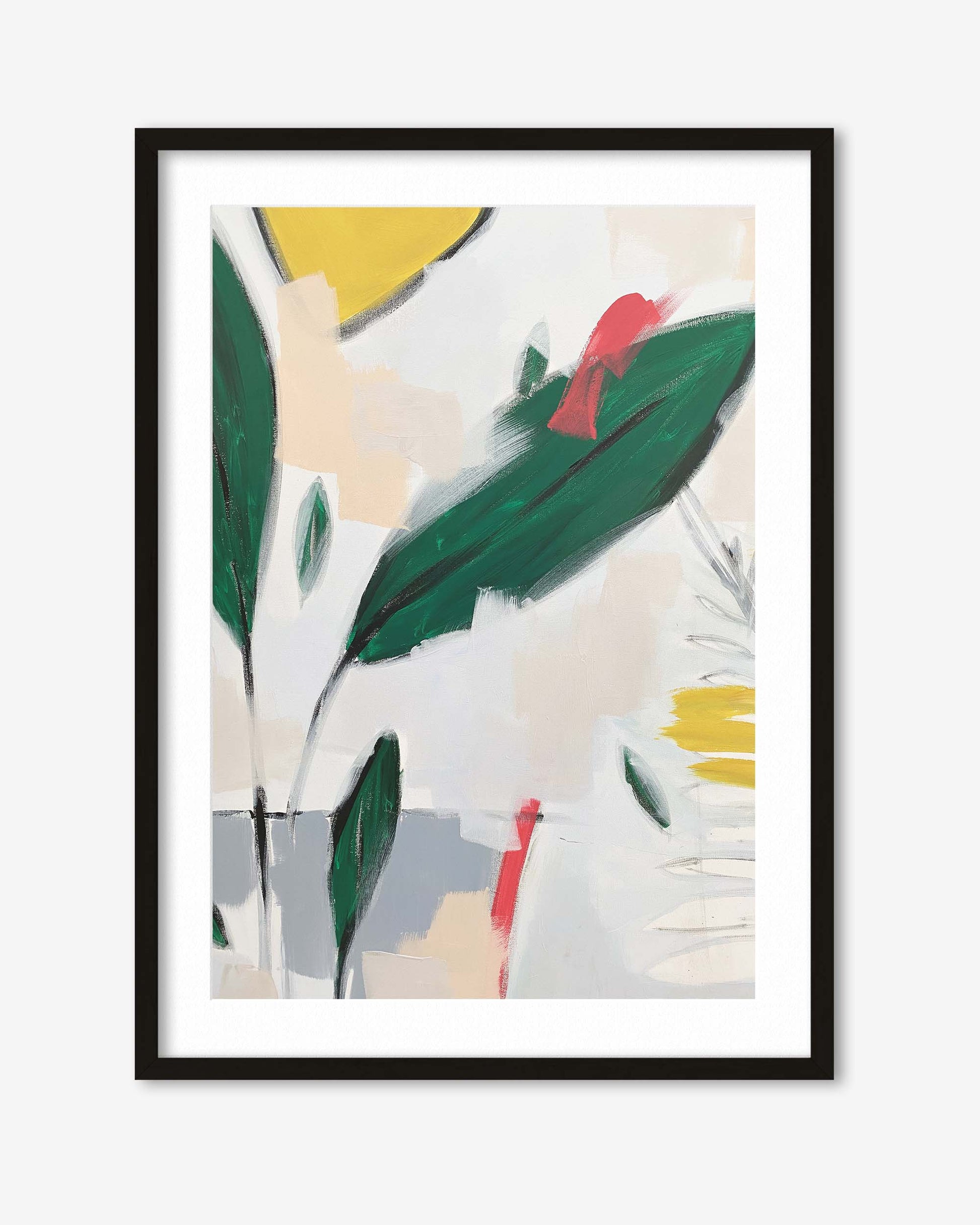 Framed abstract art print with colorful leaves on a white background