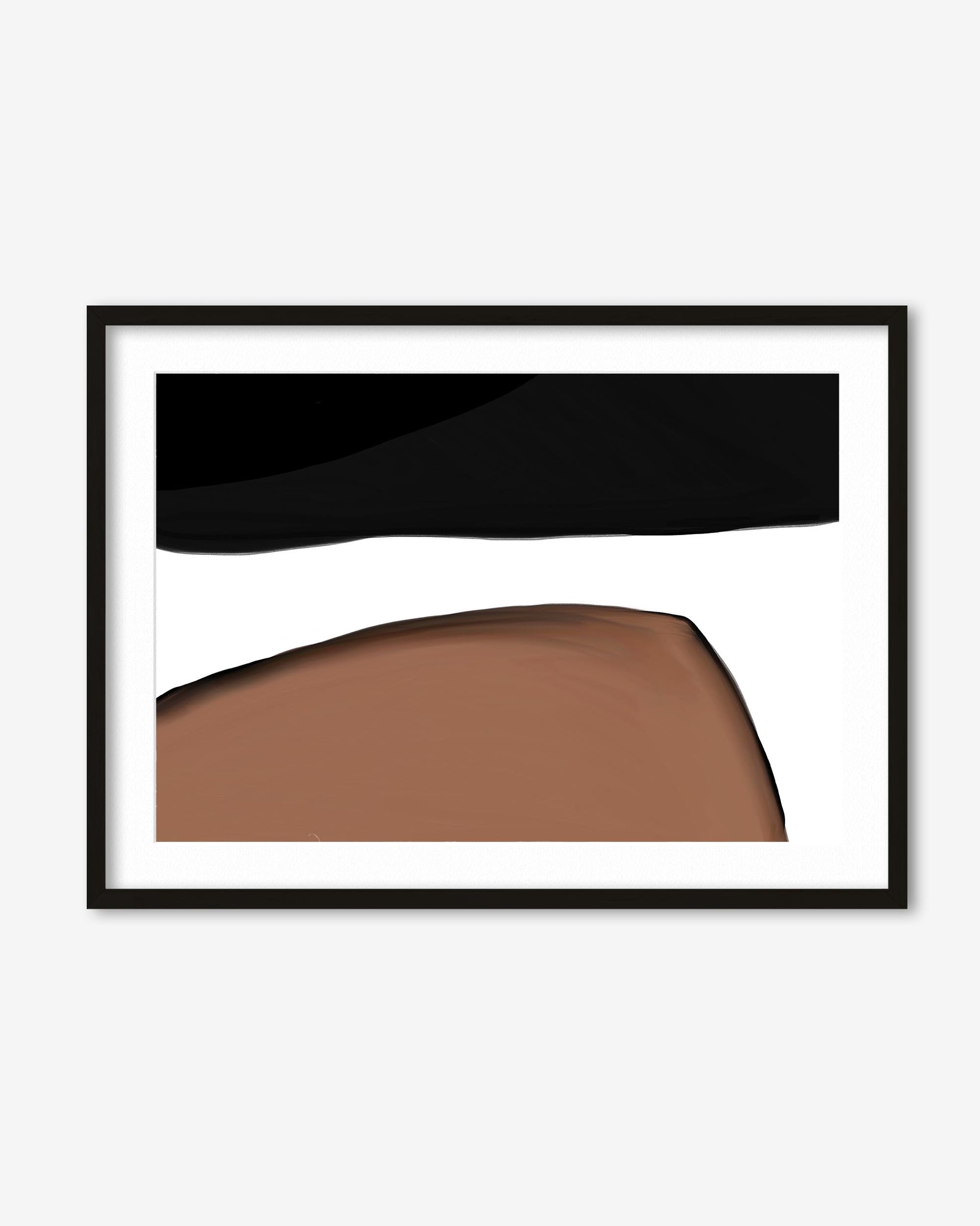 Framed abstract art with black and brown shapes on a white background