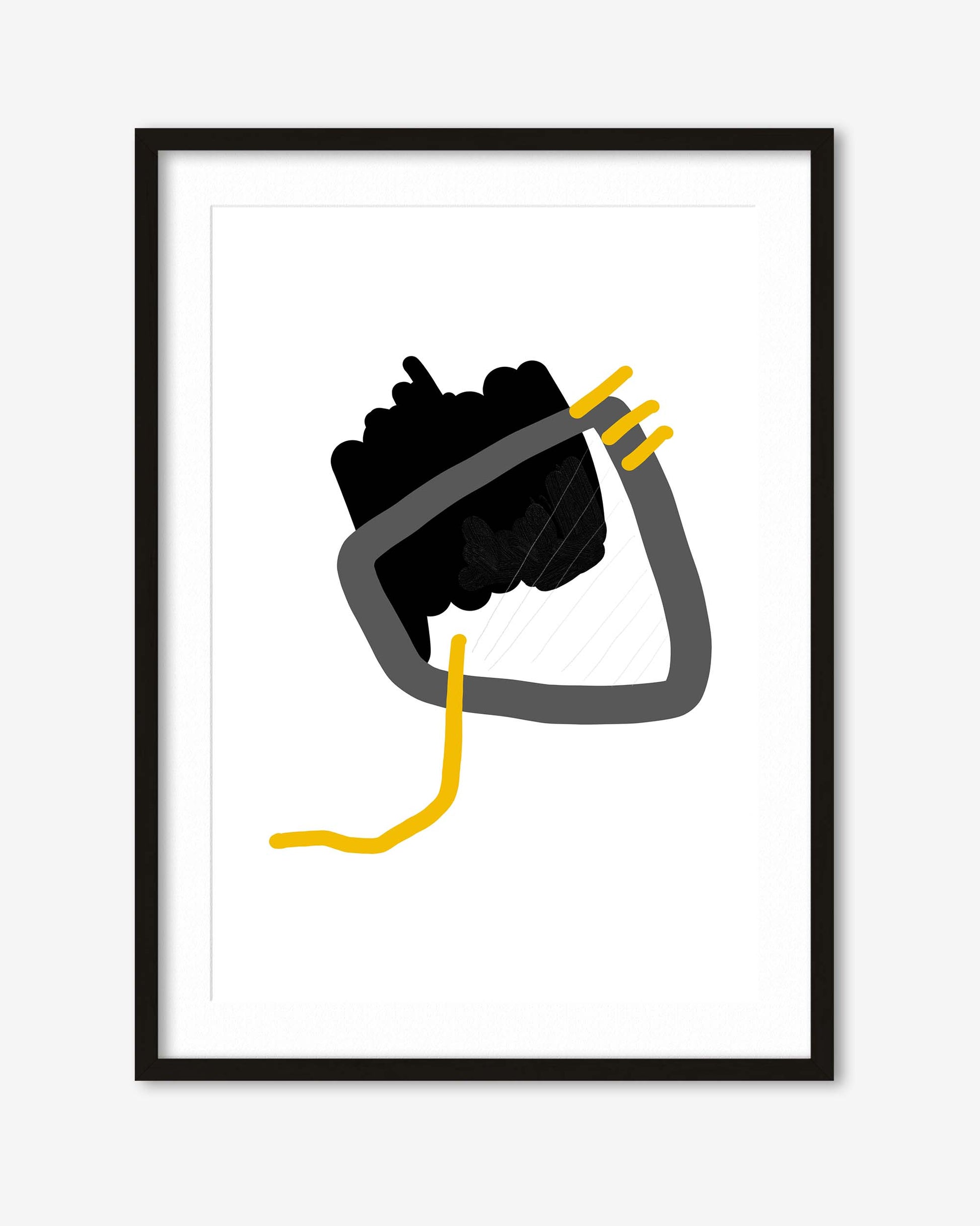 Framed artwork of a black and gray abstract design with yellow accents on a white background