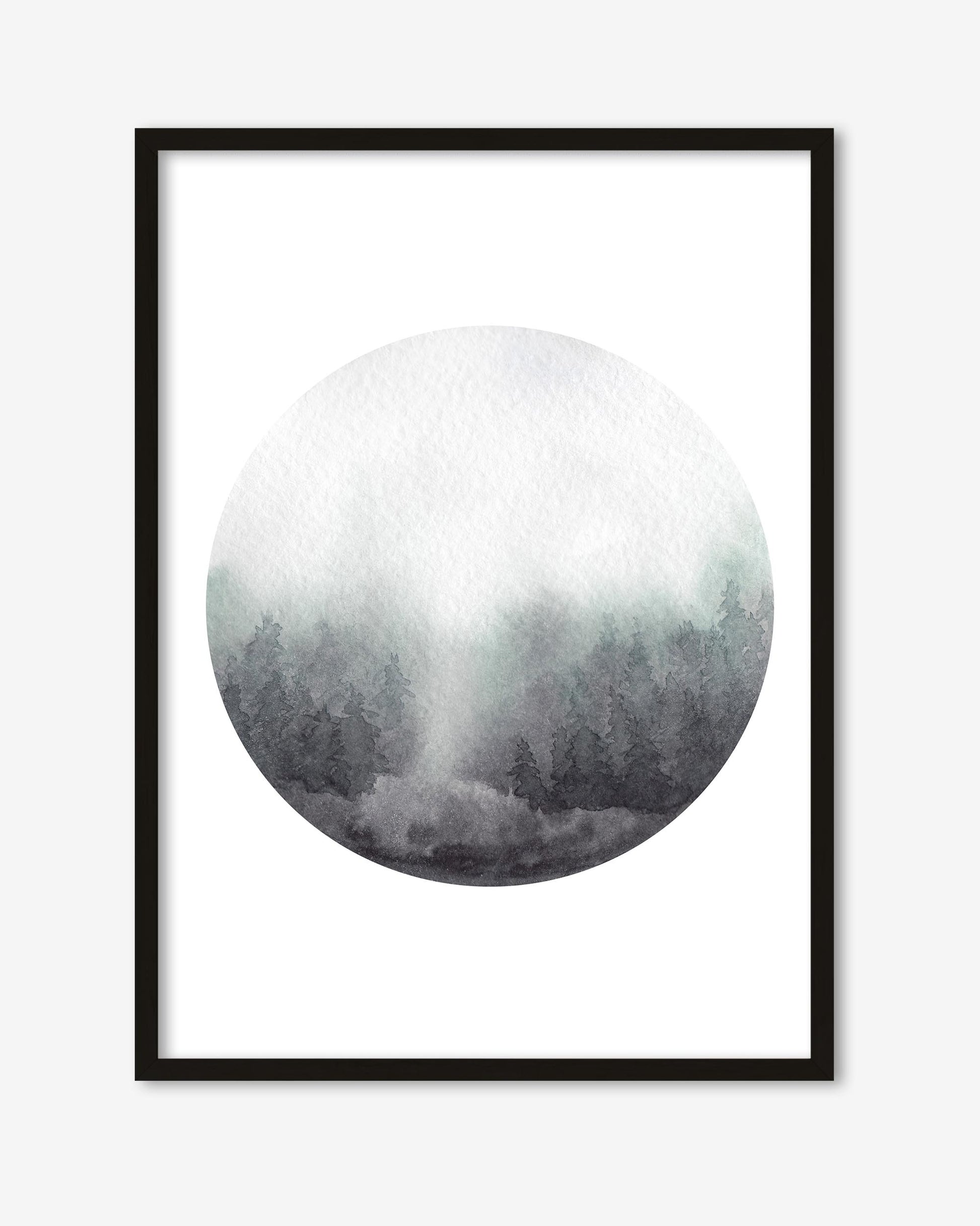 Framed artwork of a circular landscape print with a forest scene on a white background