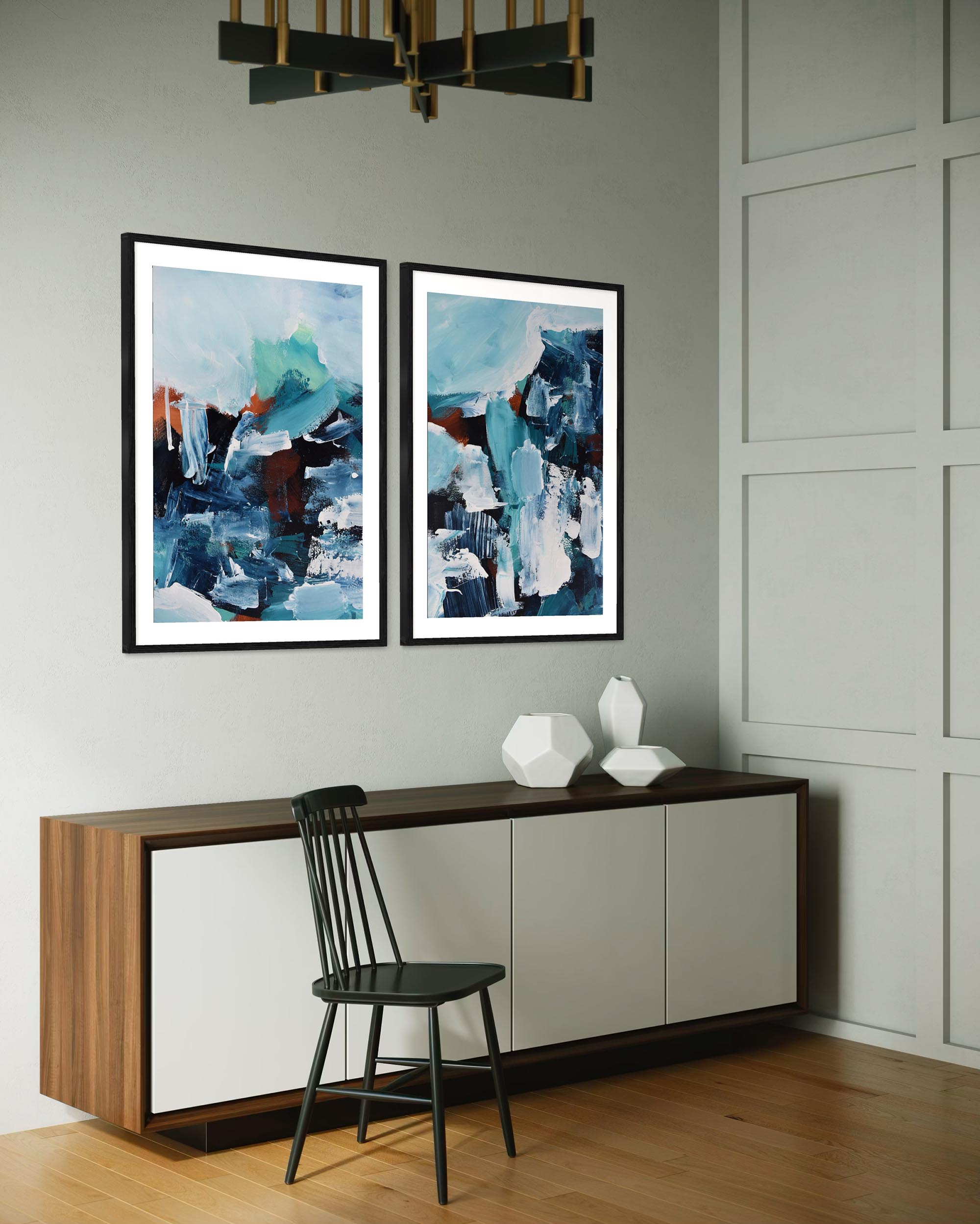 Modern interior with abstract art on the wall, a console table, and a chair.