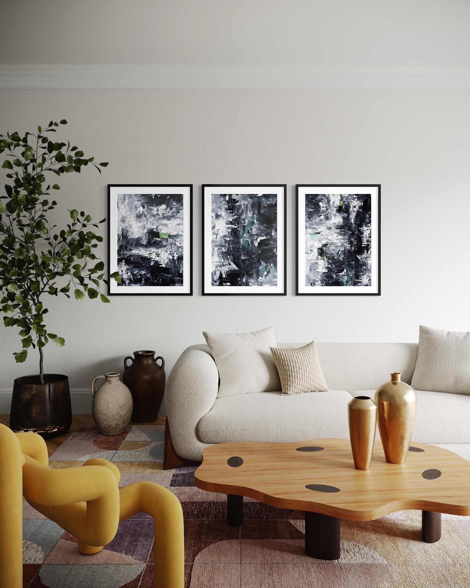 Modern living room with a white sofa, yellow chair, wooden coffee table, and abstract art on the wall.