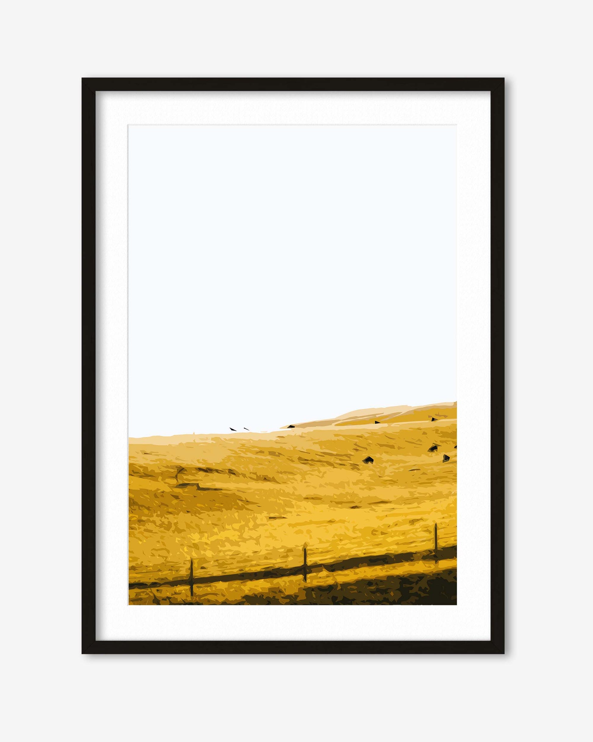 Framed artwork of a yellow landscape with a black border on a white background