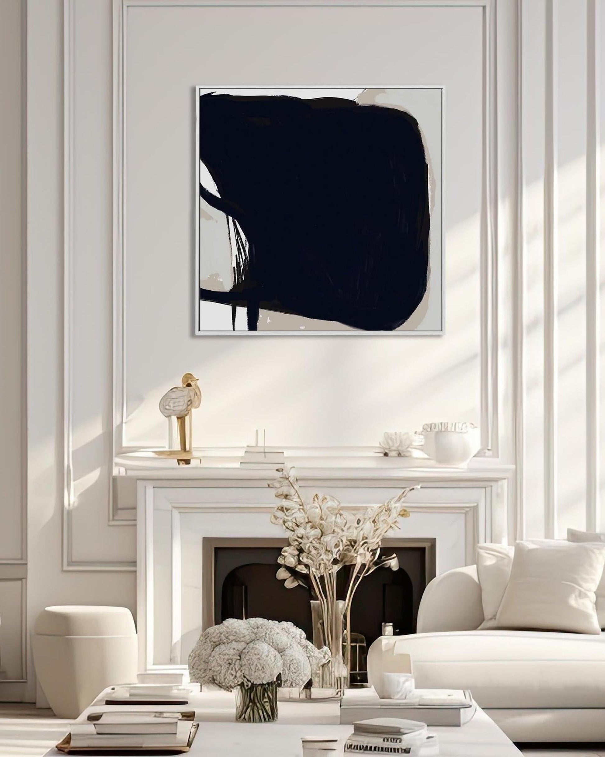 Modern living room with abstract art above a fireplace