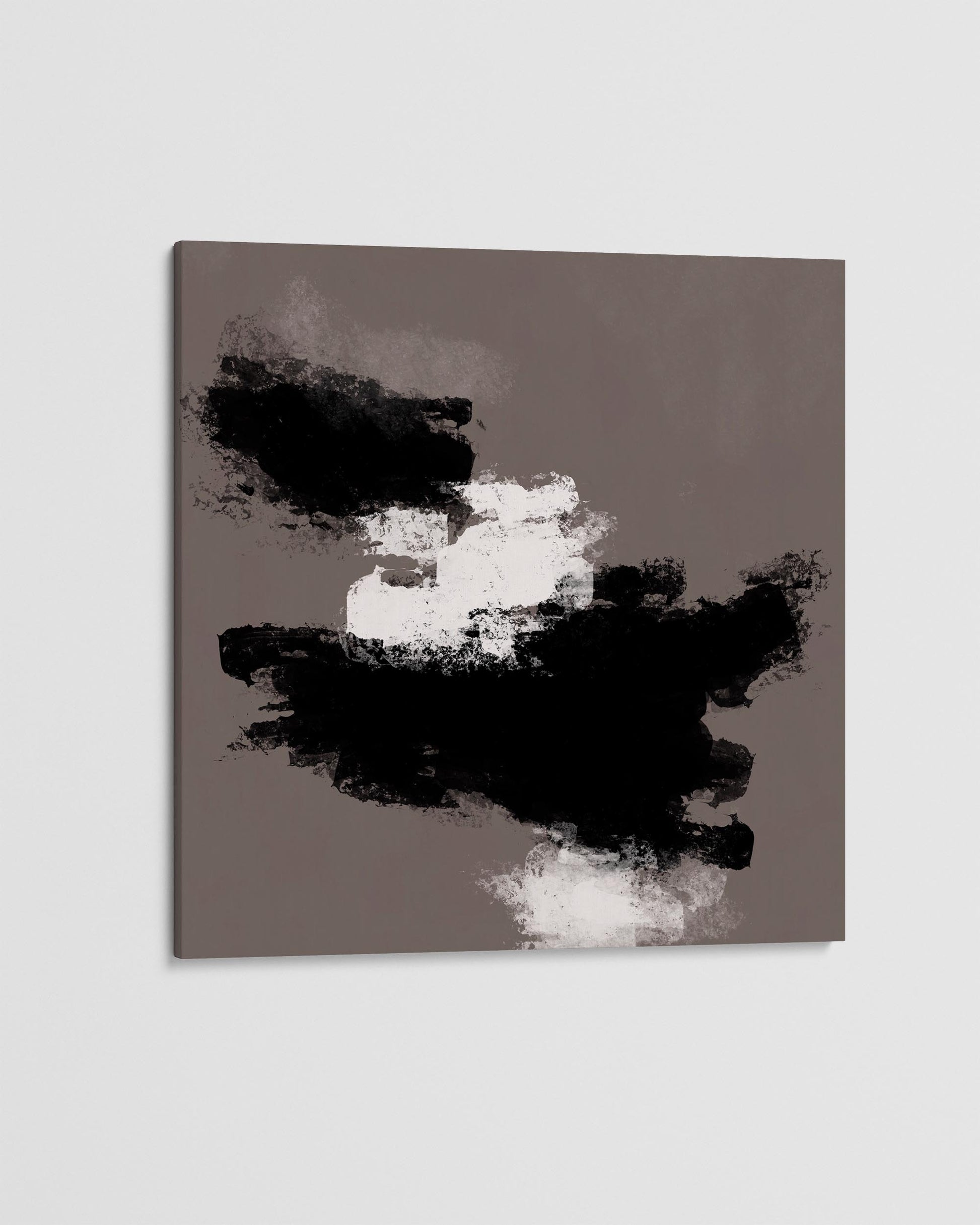 Abstract art piece with black and white shapes on a gray background