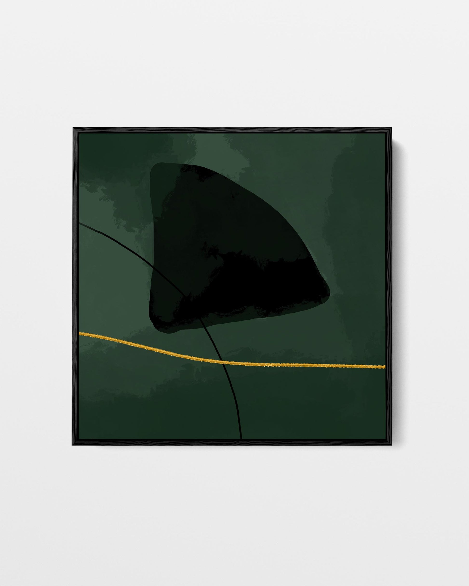 Framed artwork of a black abstract shape on a green background