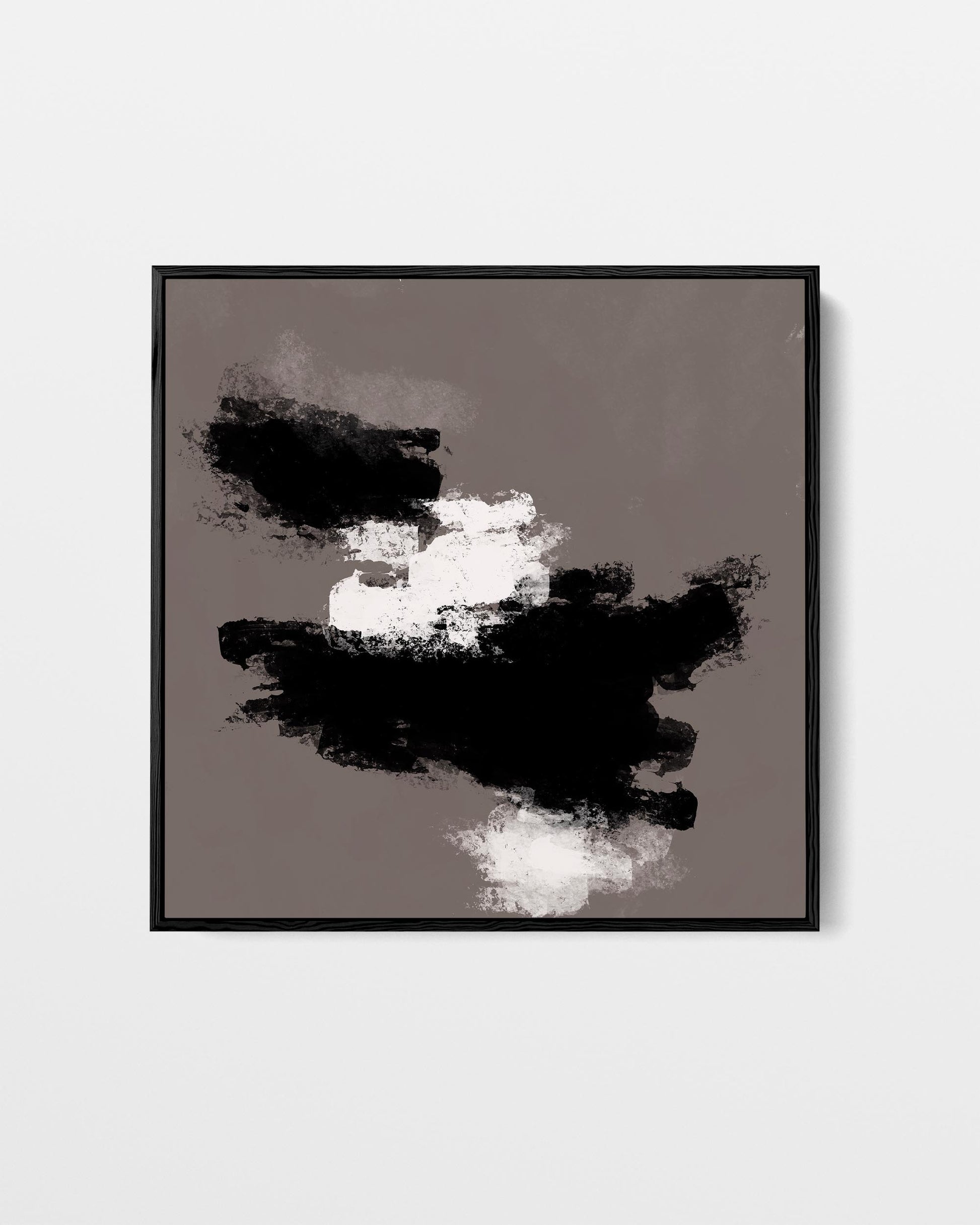 Framed abstract art with black and white brush strokes on a gray background