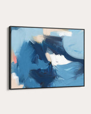 Abstract painting with blue and black strokes on a white wall