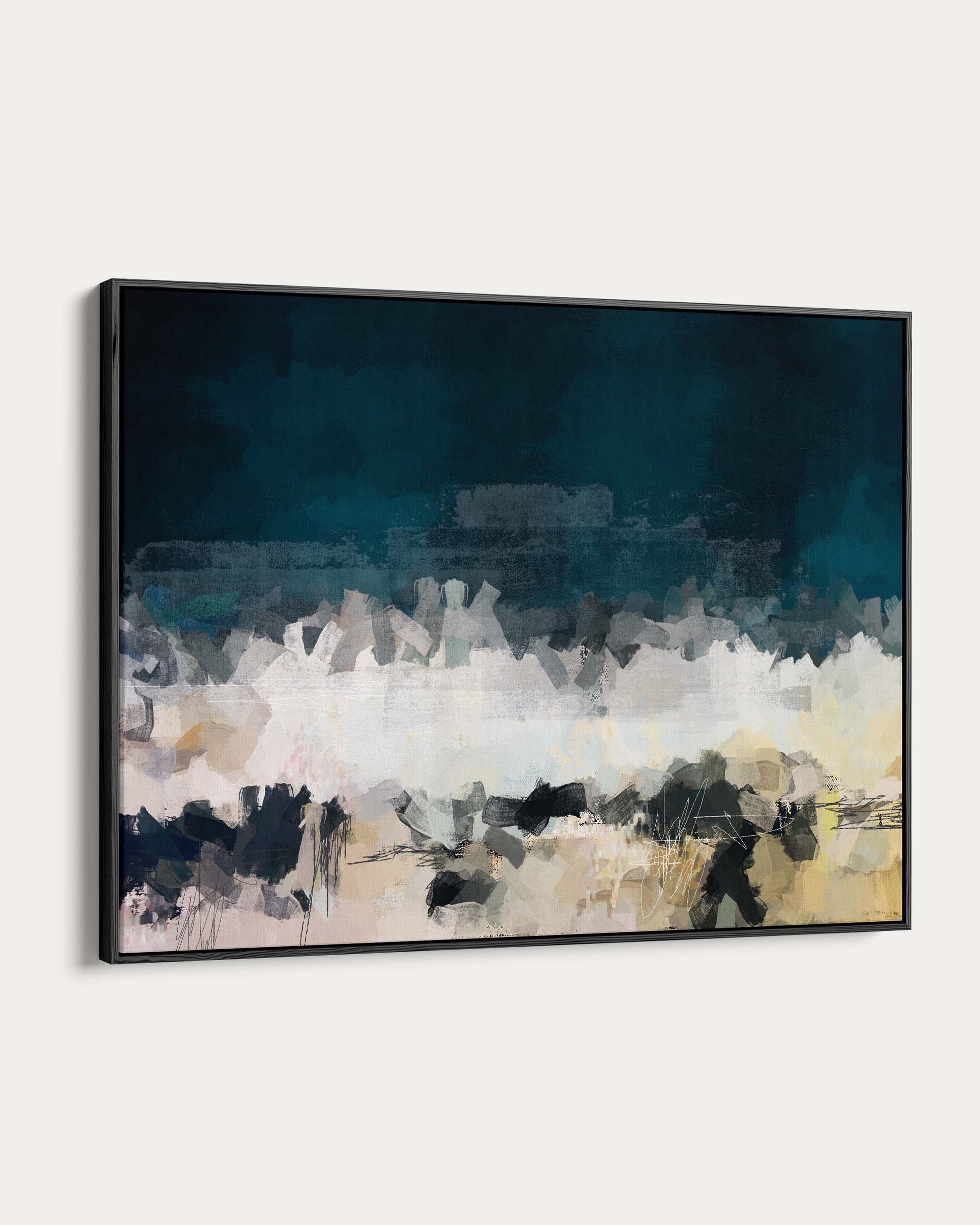 Abstract art painting with a black frame on a white wall