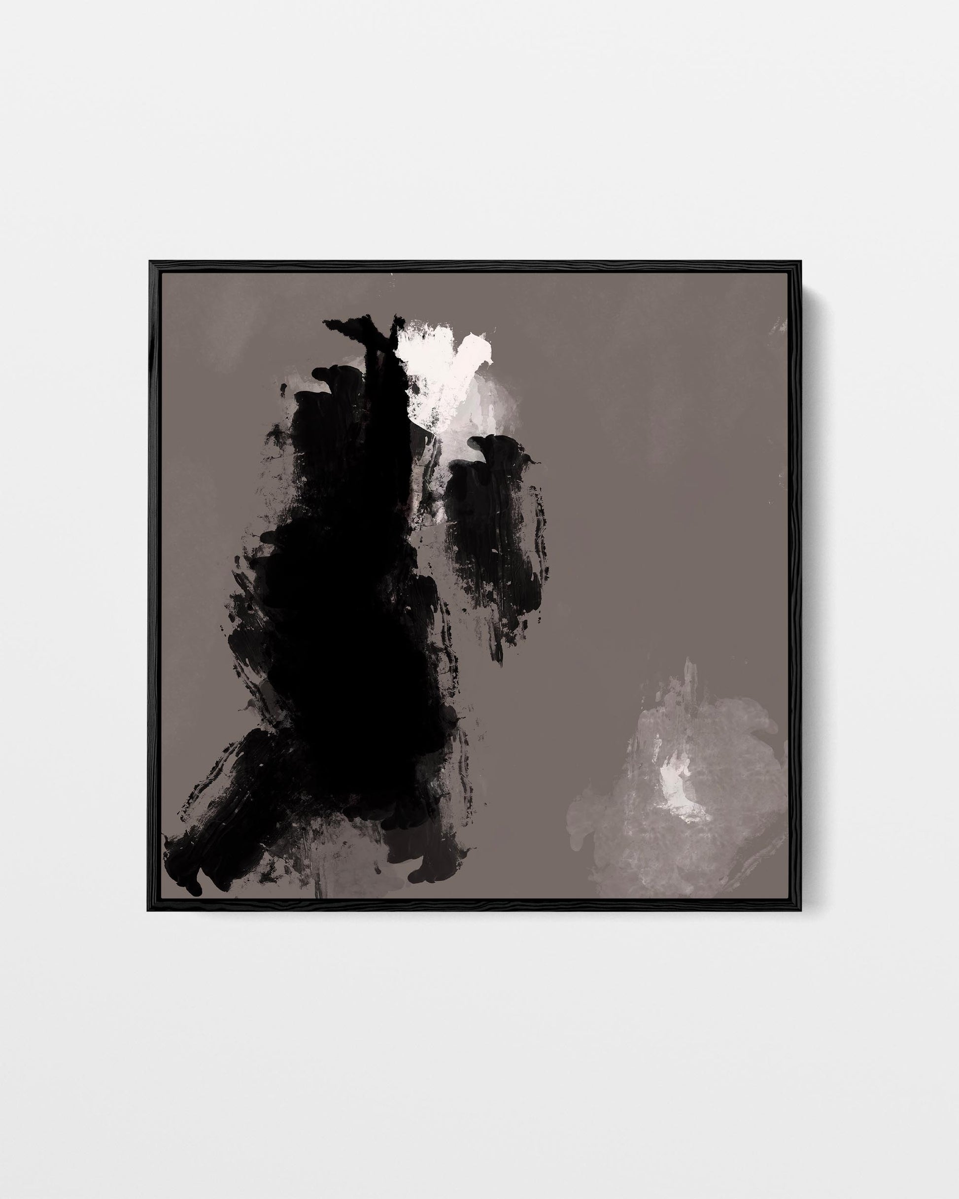 Framed abstract art print with black and white shapes on a gray background