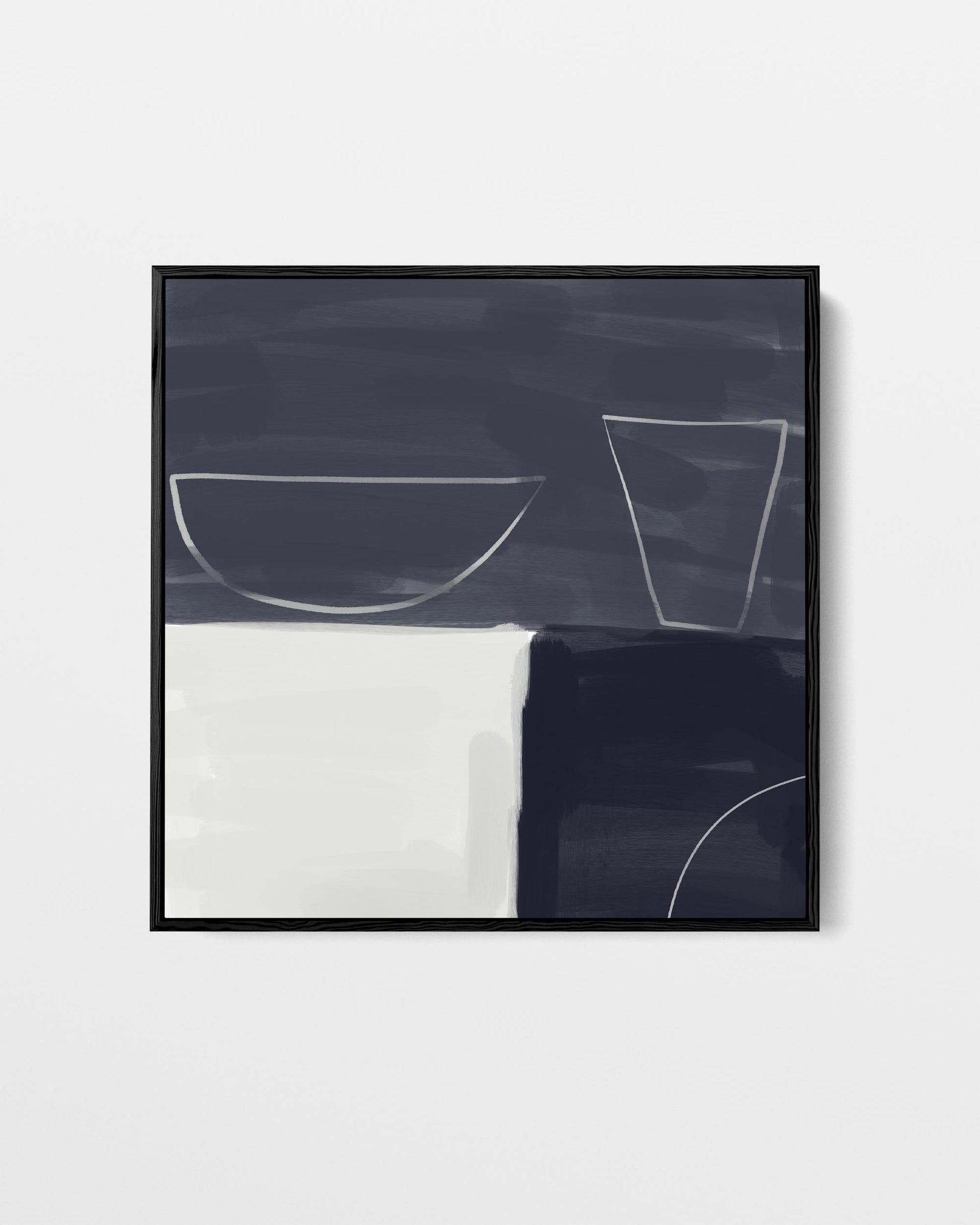 Framed abstract art with geometric shapes on a white background