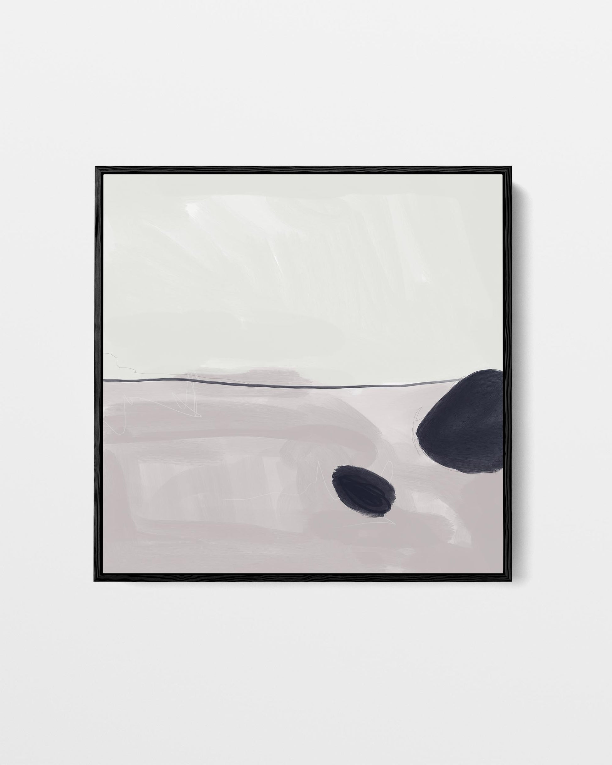 Framed abstract art with black and gray shapes on a white background