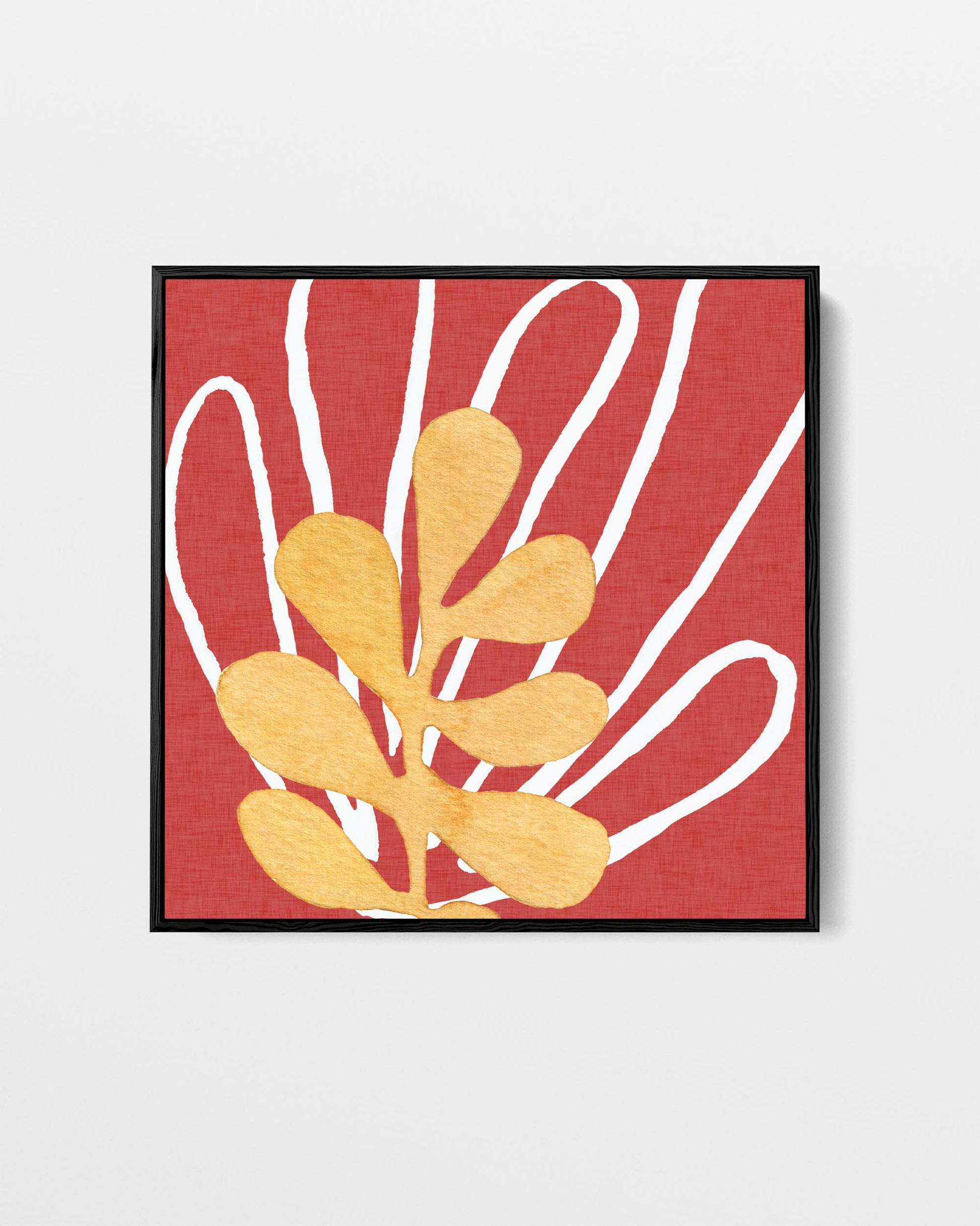 Framed artwork with yellow abstract design on a red background