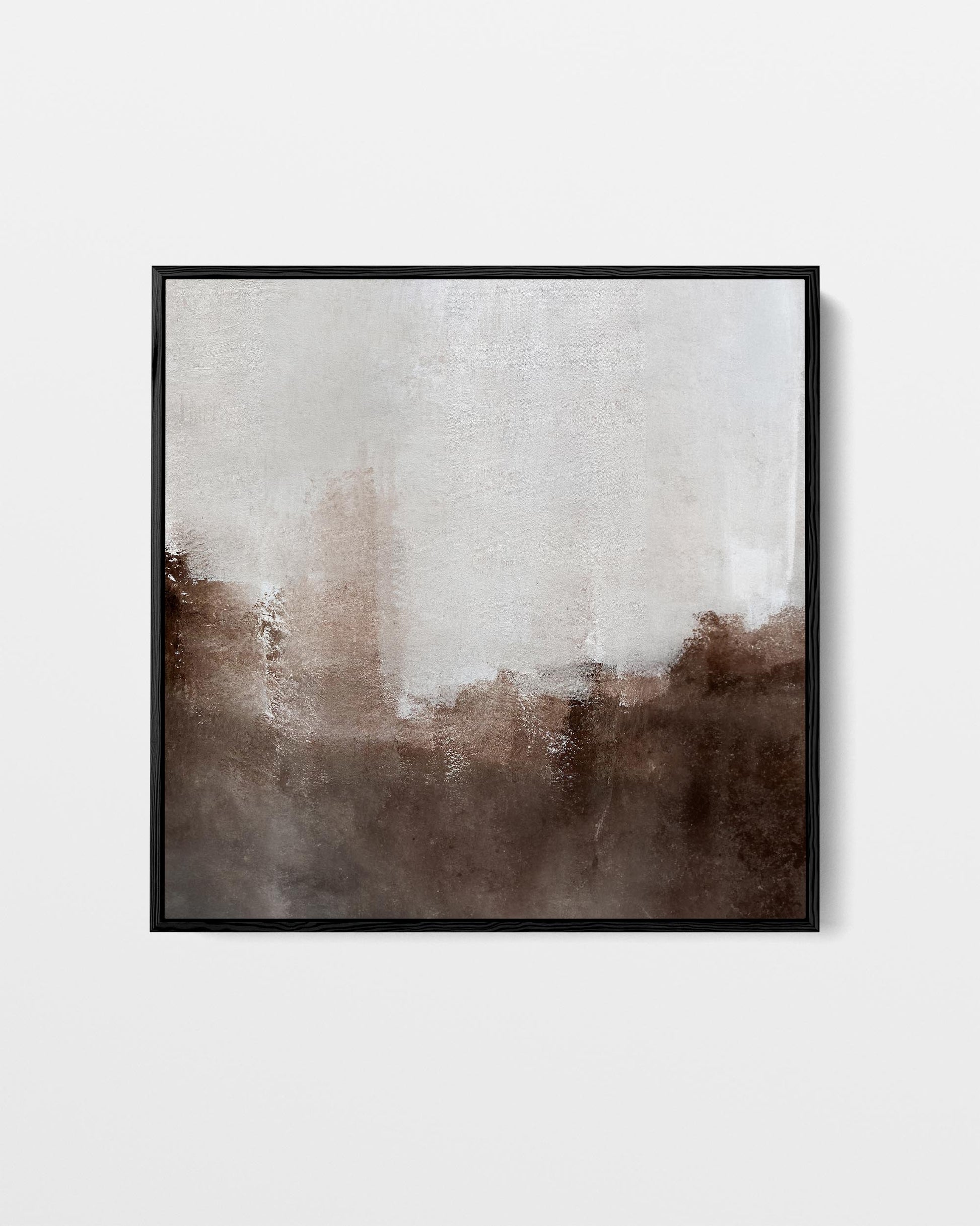 Abstract art print with brown and white gradient in a black frame on a light gray background