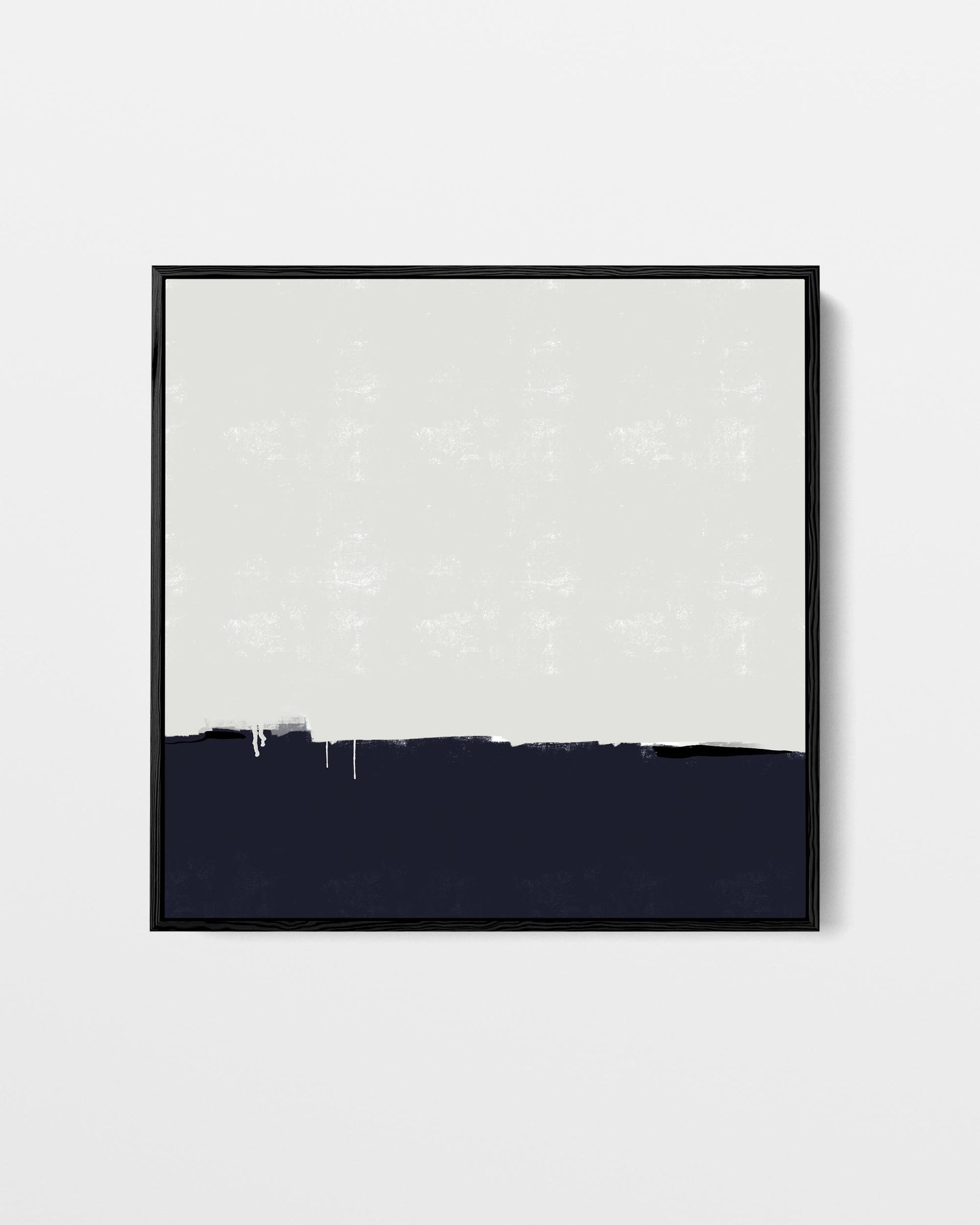 Framed abstract art piece with black and white color scheme on a light gray background